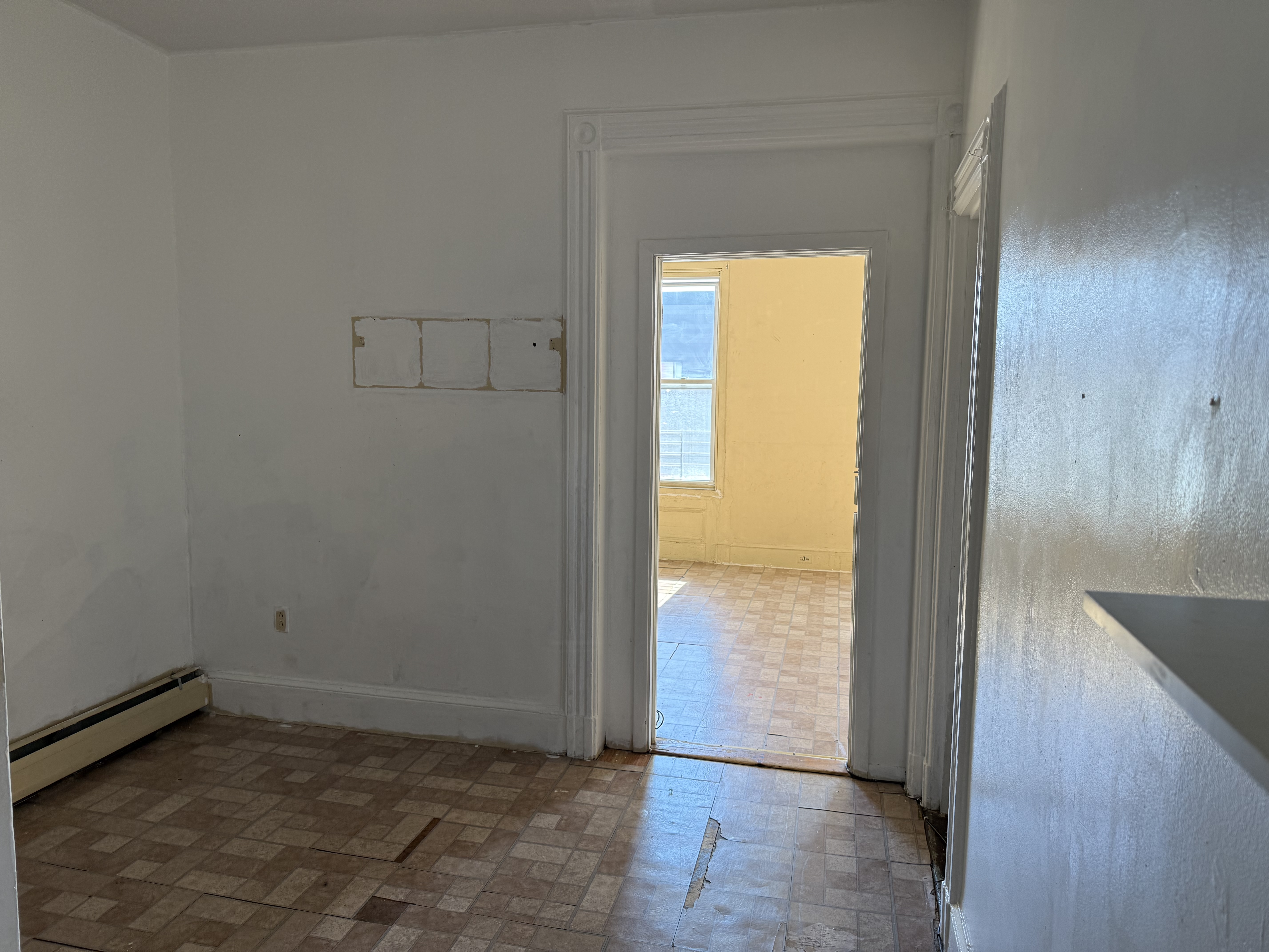 453 Central Avenue Jersey City, NJ 07307 - Photo 19 of 25 an empty room with windows and closet