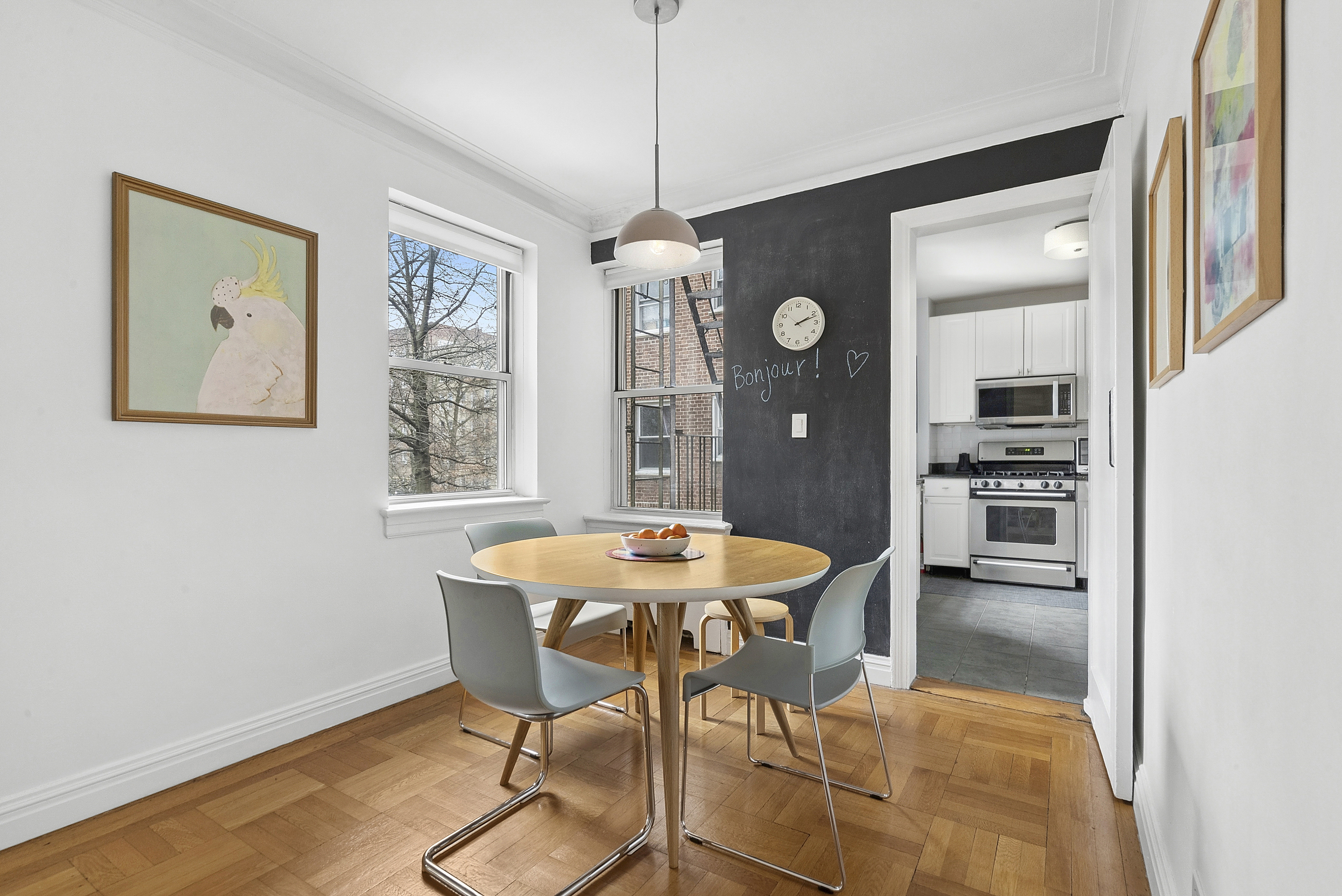 474 West 238th Street, Unit 2E Bronx, NY 10463 - Photo 2 of 13 a dining room with furniture and window