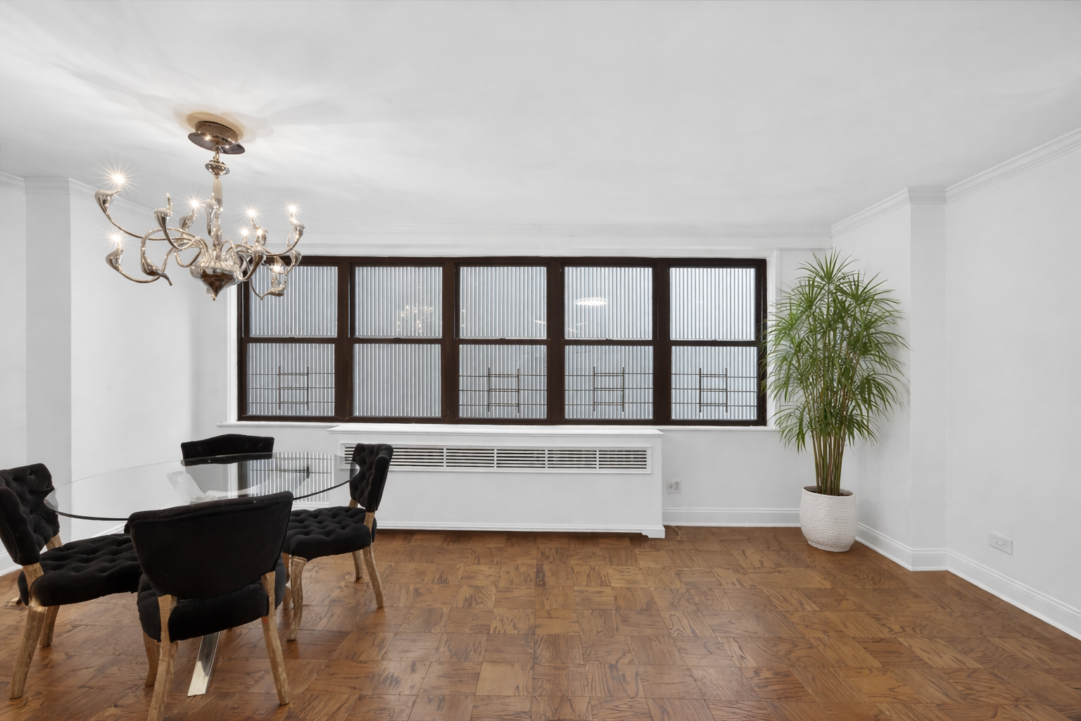 330 3rd Avenue, Unit 8A Manhattan, NY 10010 - Photo 4 of 13 a living room with furniture and a large window