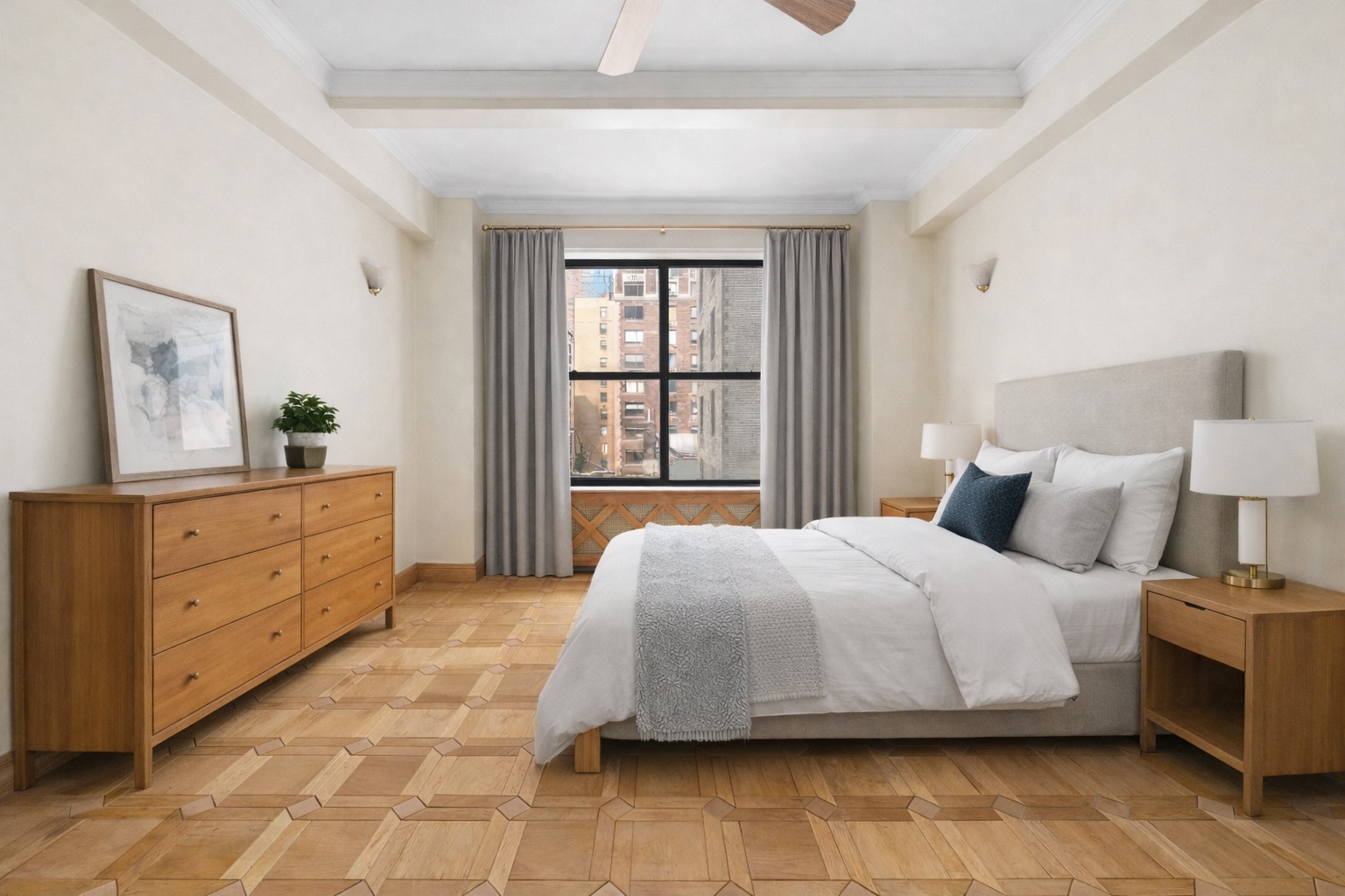 a bedroom with a large bed and a window