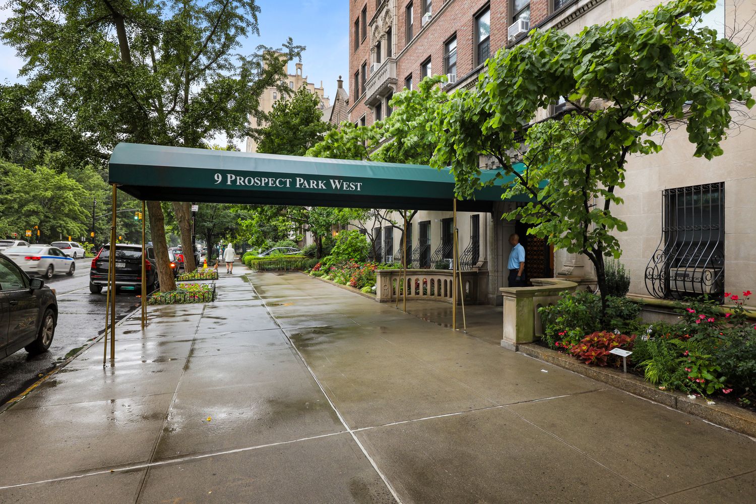 9 Prospect Park West, Unit GRND Brooklyn, NY 11215 - Photo 9 of 12 a view of a patio with table and chairs potted plants and large tree