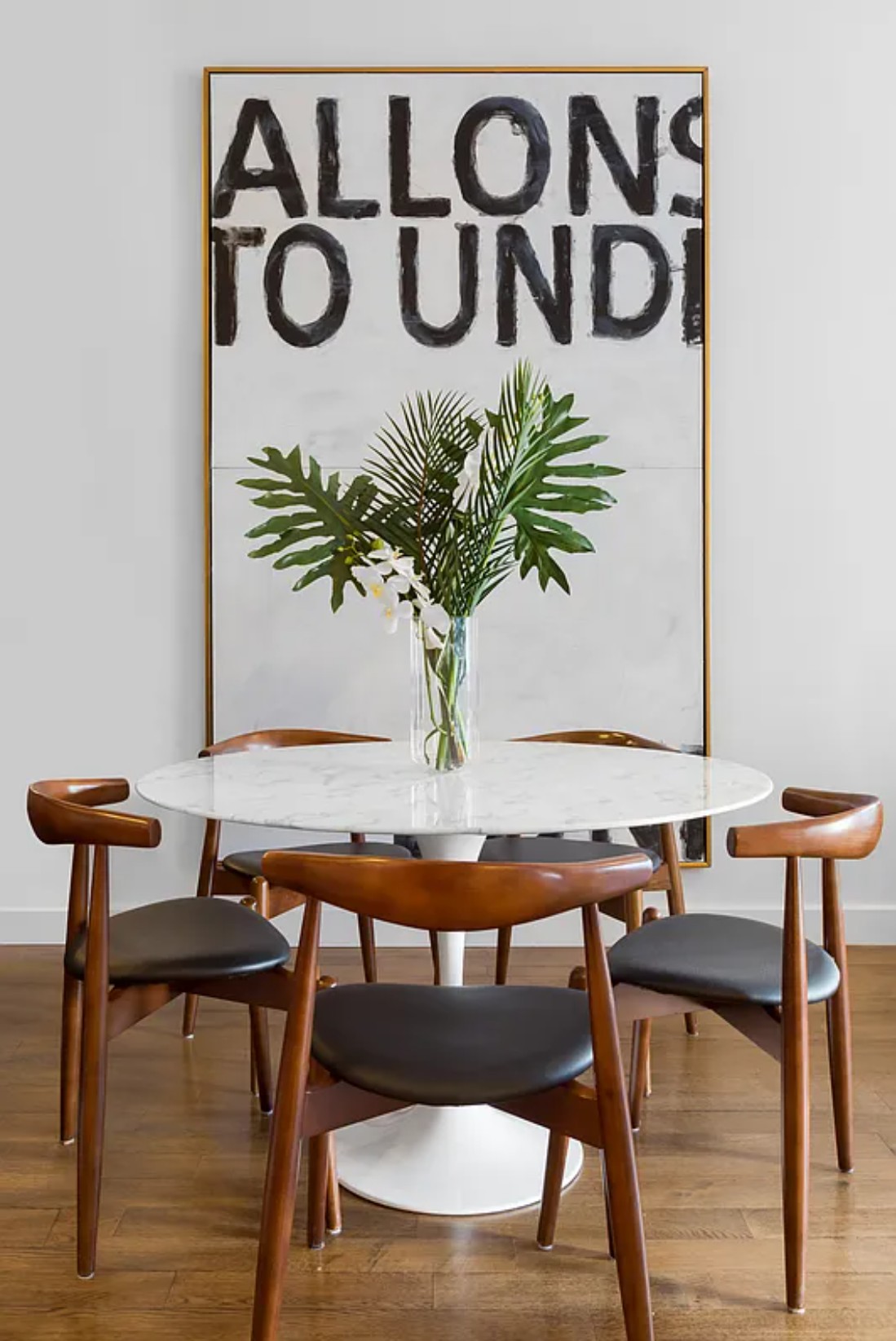 225 5th Avenue, Unit PHY Manhattan, NY 10010 - Photo 6 of 10 a view of a dining room with furniture and wooden floor