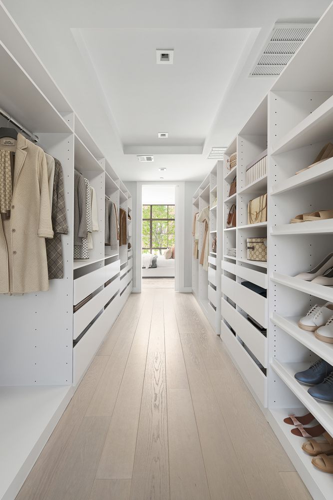 520 East 89th Street Manhattan, NY 10128 - Photo 18 of 40 a view of walk in closet with empty racks