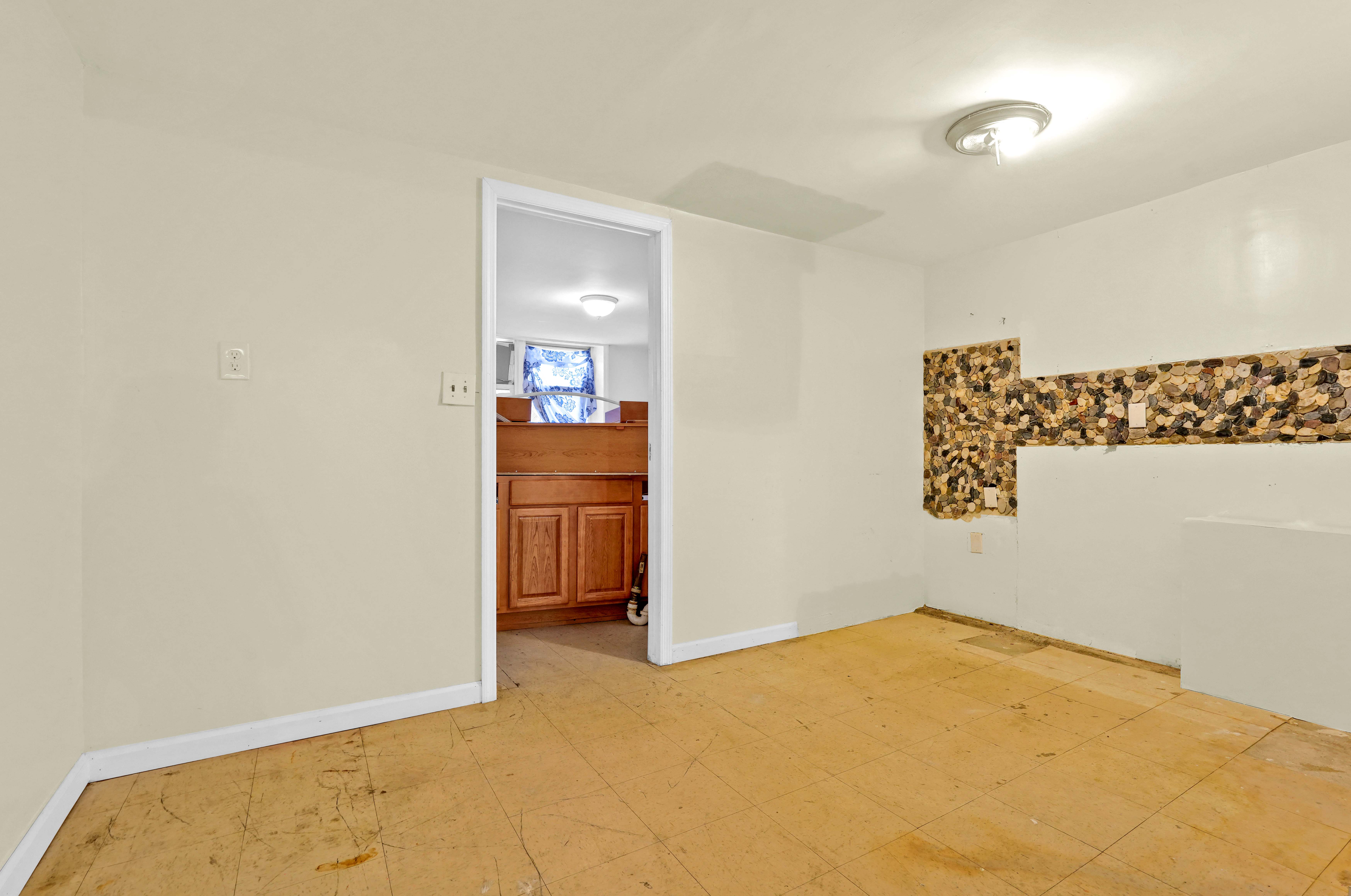 659 Jerome Street Brooklyn, NY 11207 - Photo 29 of 39 an empty room with a bathroom