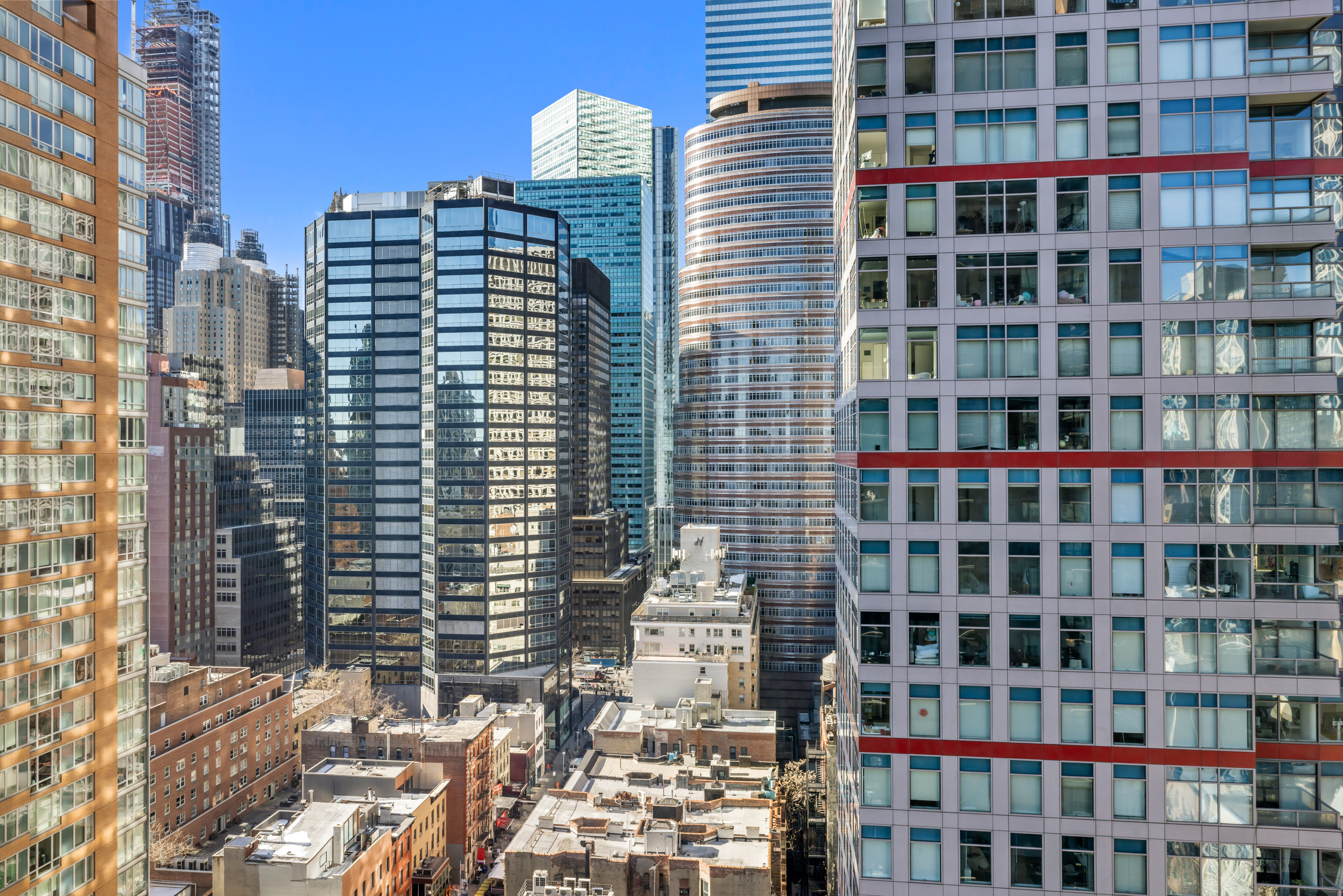 300 East 54th Street, Unit 23E Manhattan, NY 10022 - Photo 4 of 13 a front view of a building