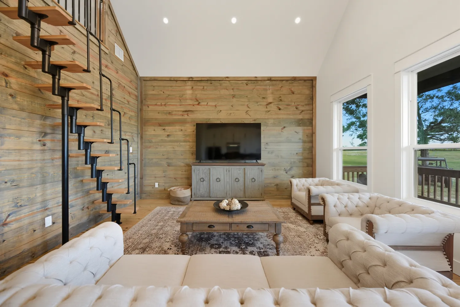 a view of a house with yard and a yard