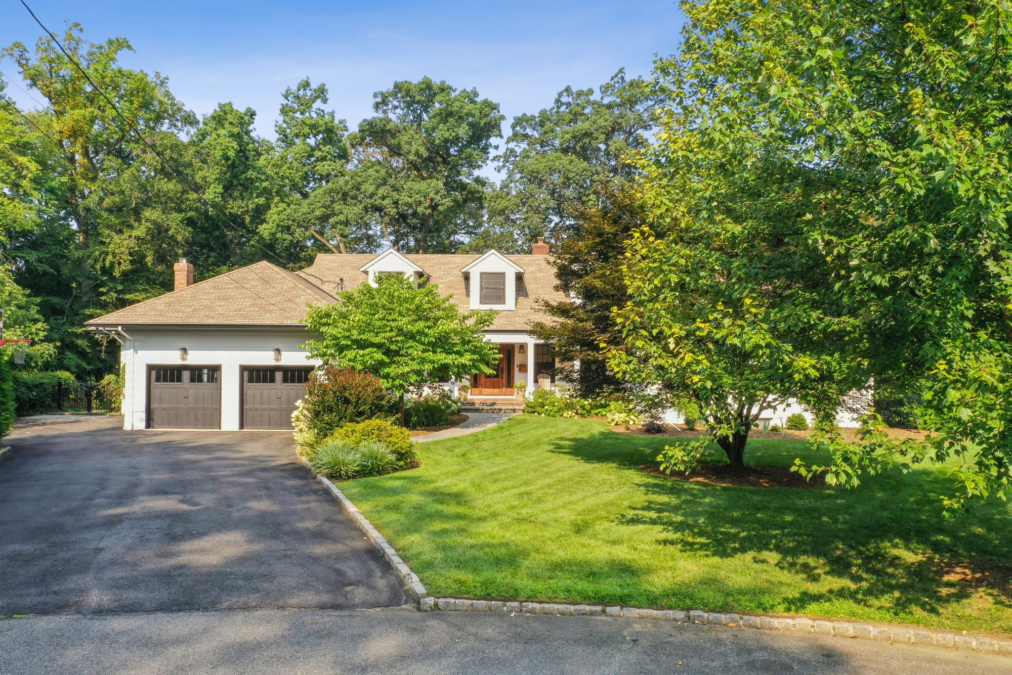 35 Lawrence Road Madison, NJ 07940 - Photo 3 of 35 a front view of a house with a yard