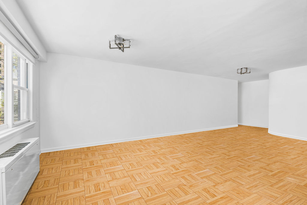 101 West 12th Street, Unit 5V Manhattan, NY 10011 - Photo 19 of 26 a view of empty room with window