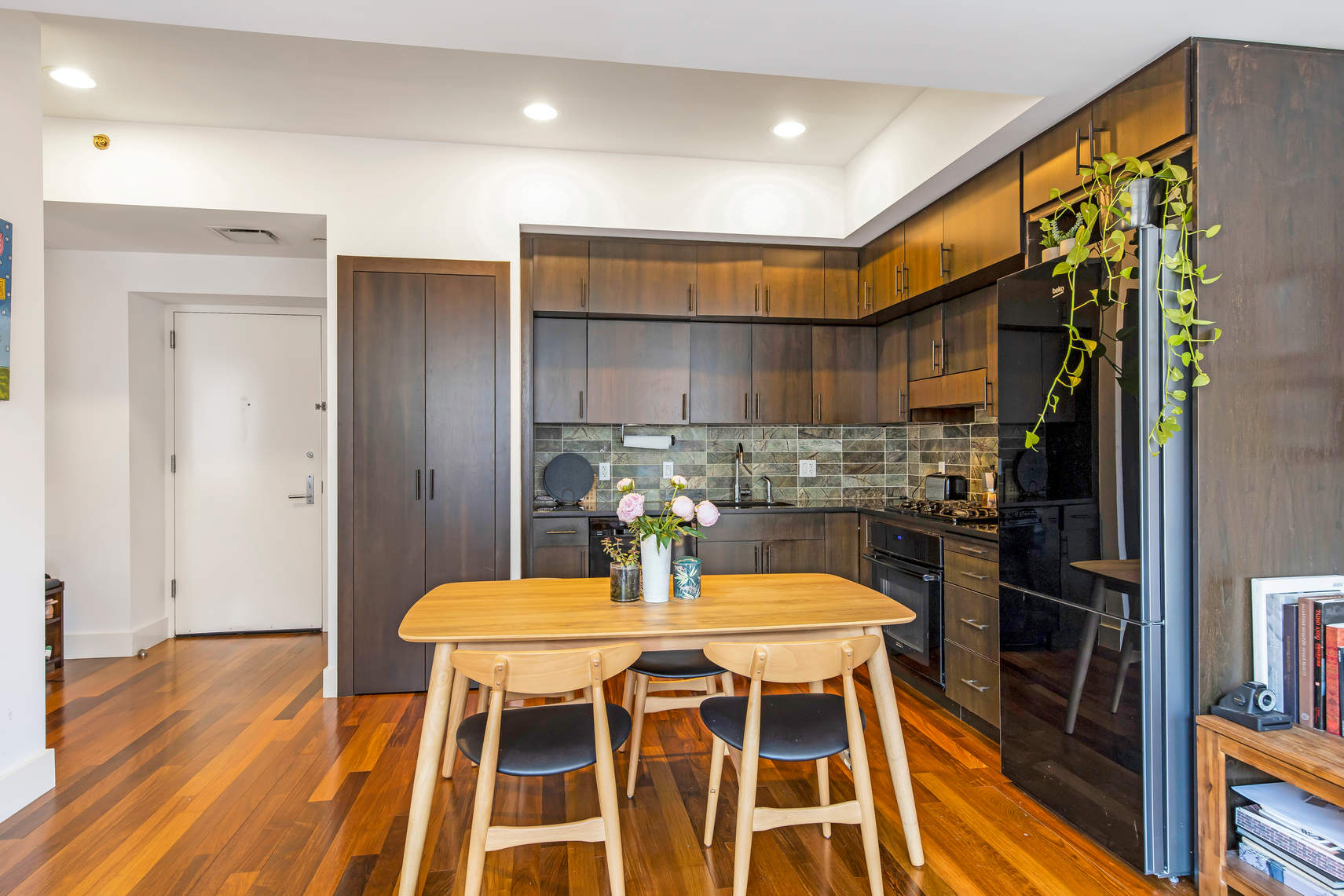150 Myrtle Avenue, Unit 805 Brooklyn, NY 11201 - Photo 5 of 26 a kitchen with a table and chairs in it