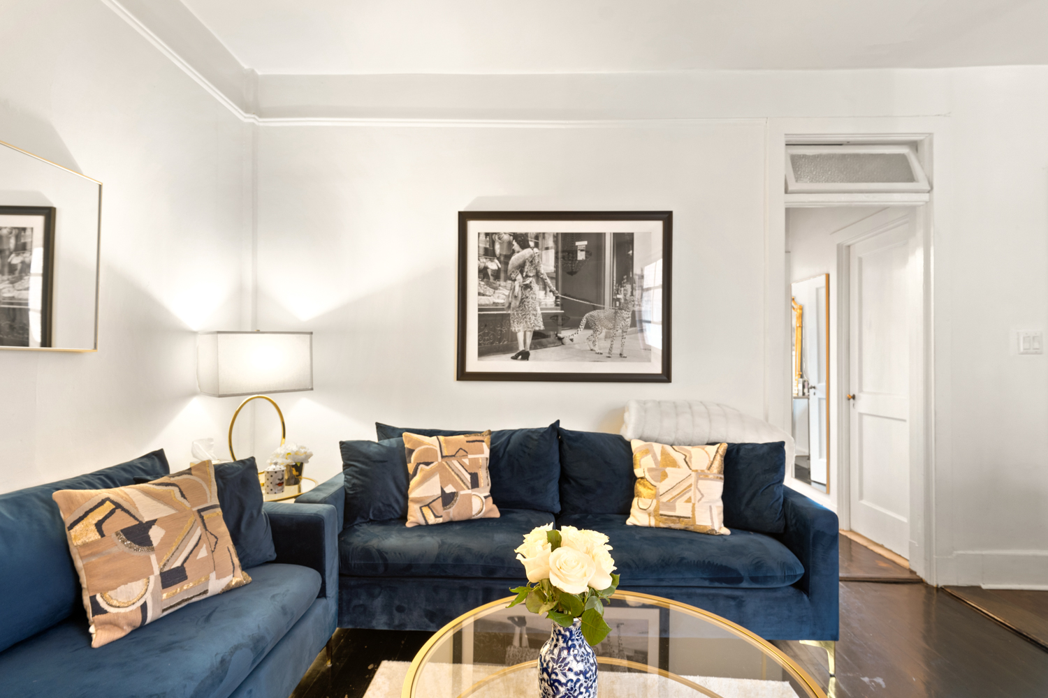 78 Bedford Street, Unit 4C Manhattan, NY 10014 - Photo 2 of 10 a living room with furniture and wooden floor