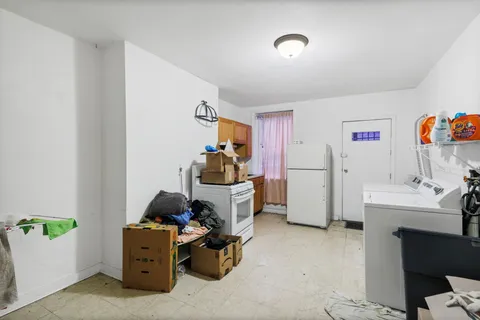 a bedroom with a bed and cabinets