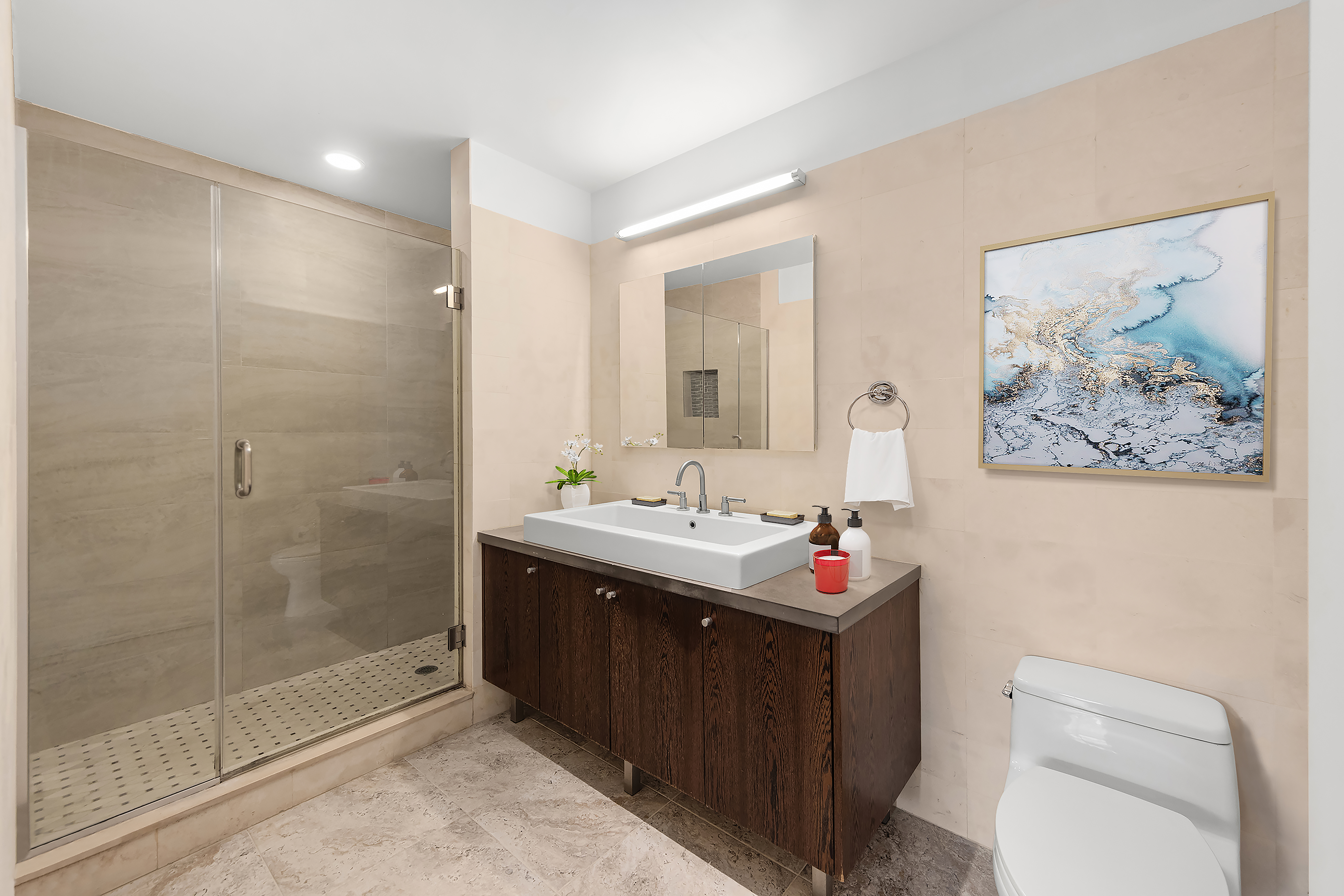 26 Broadway, Unit 402 Brooklyn, NY 11249 - Photo 7 of 17 a bathroom with a sink toilet and shower