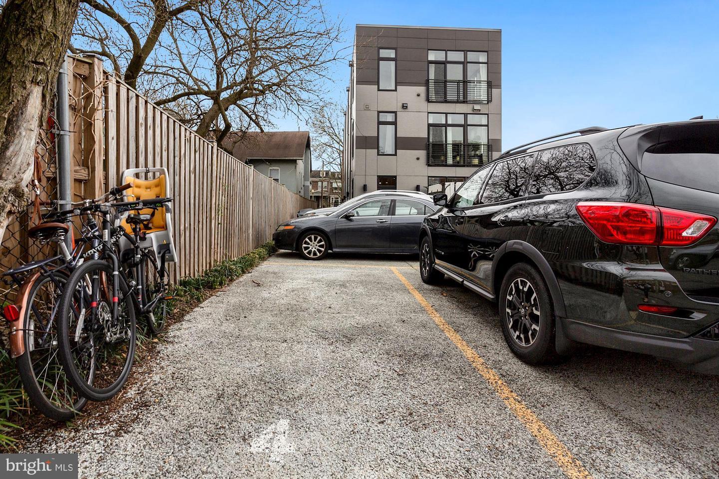129 Varnum Street Northwest, Unit 6 Washington, DC 20011 - Photo 24 of 25 a view of a car parked in front of a house