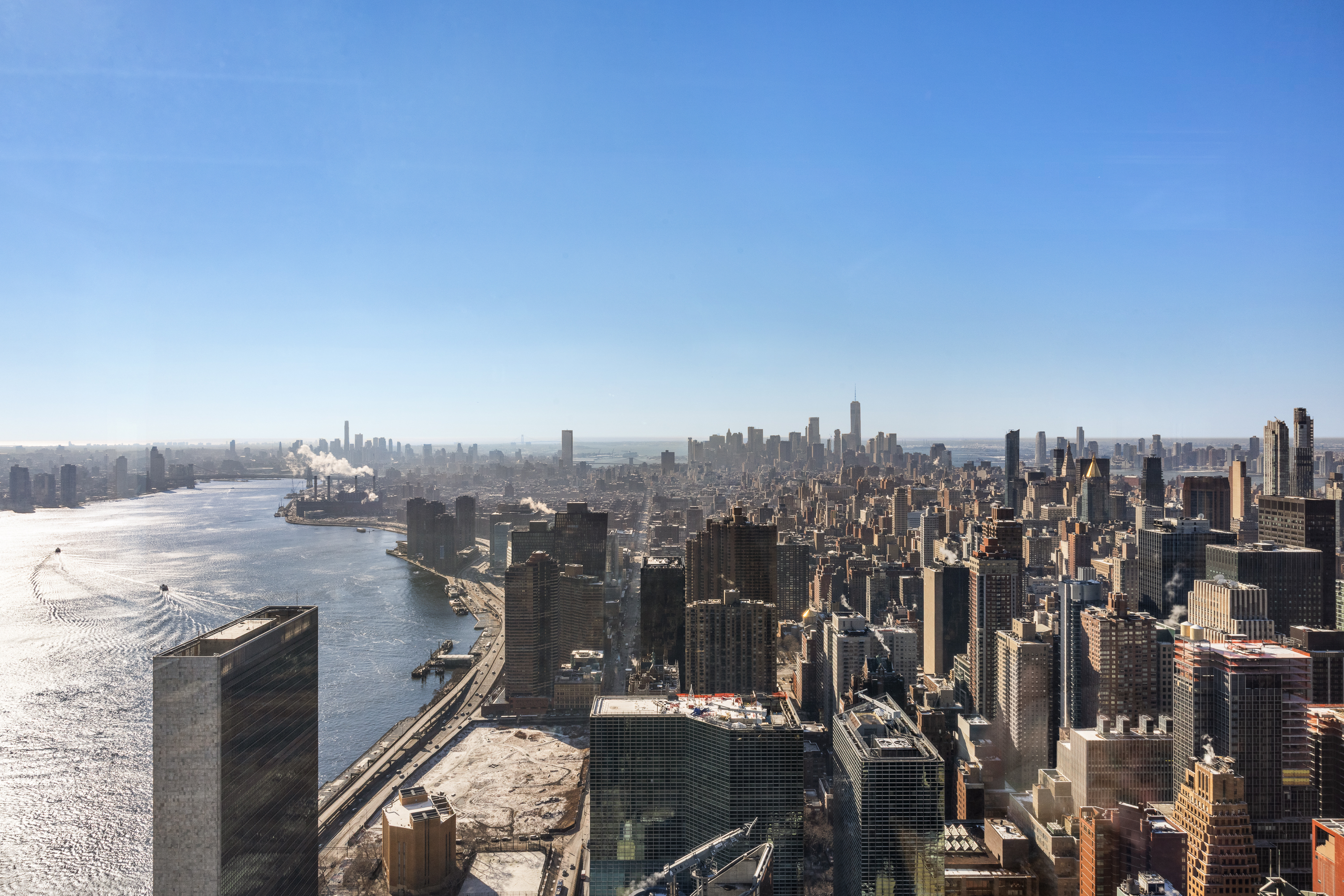 845 United Nations Plaza, Unit 86B Manhattan, NY 10017 - Photo 15 of 16 a view of a city