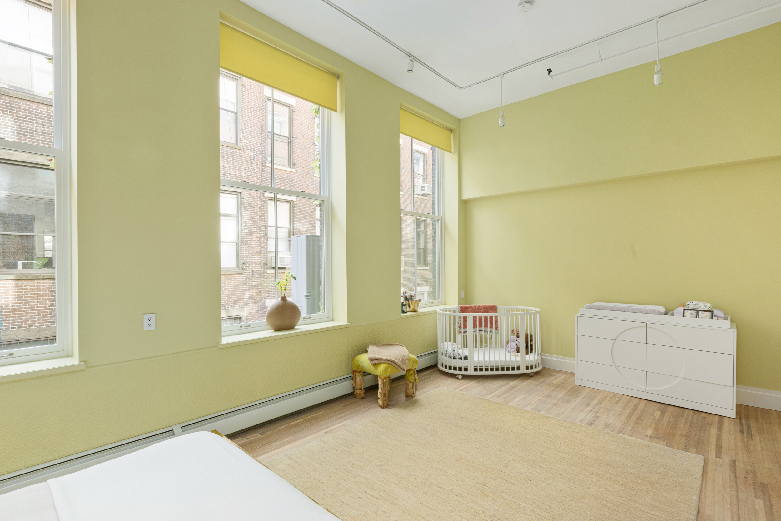55 Walker Street, Unit 3A Manhattan, NY 10013 - Photo 8 of 12 a bedroom with furniture and a window