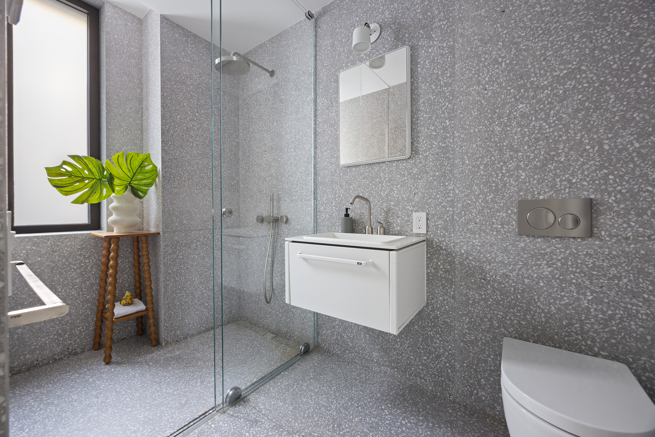 455 West 19th Street, Unit 3 Manhattan, NY 10011 - Photo 29 of 30 a bathroom with a sink a toilet and shower