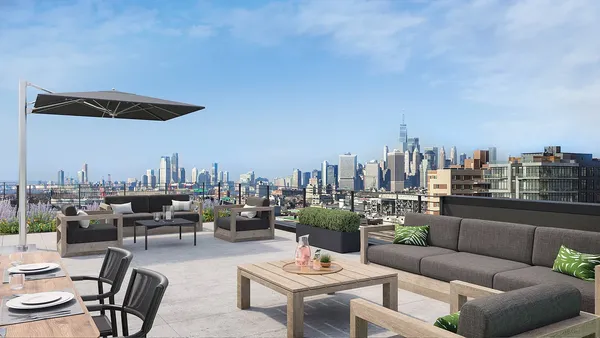 a view of a terrace with furniture