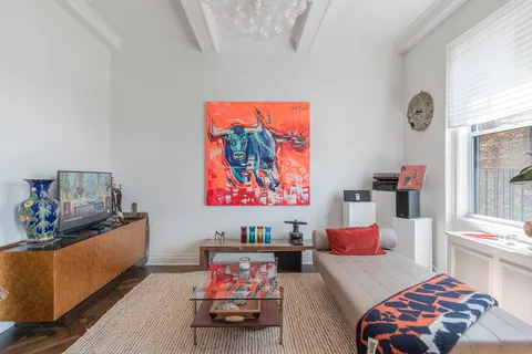 a bedroom with furniture and a couch