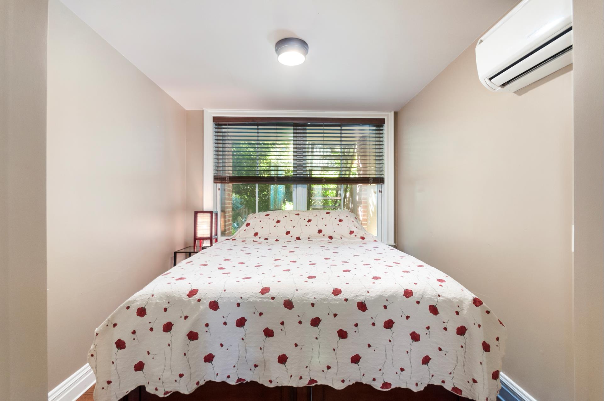 150 Dean Street, Unit 1 Brooklyn, NY 11217 - Photo 6 of 7 a bedroom with a bed and a window