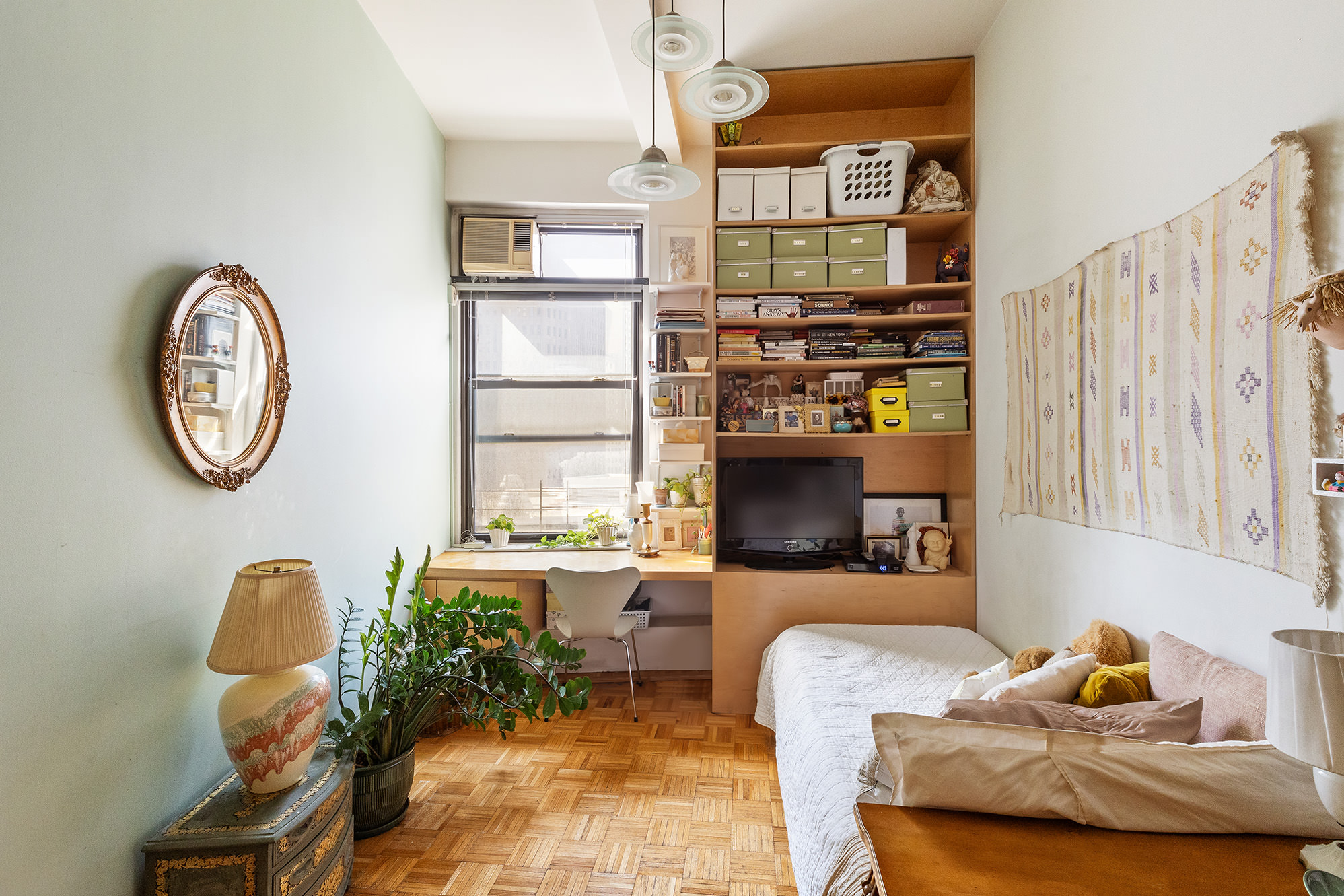 3 Hanover Square, Unit 14EF Manhattan, NY 10004 - Photo 9 of 14 a living room with furniture and a window