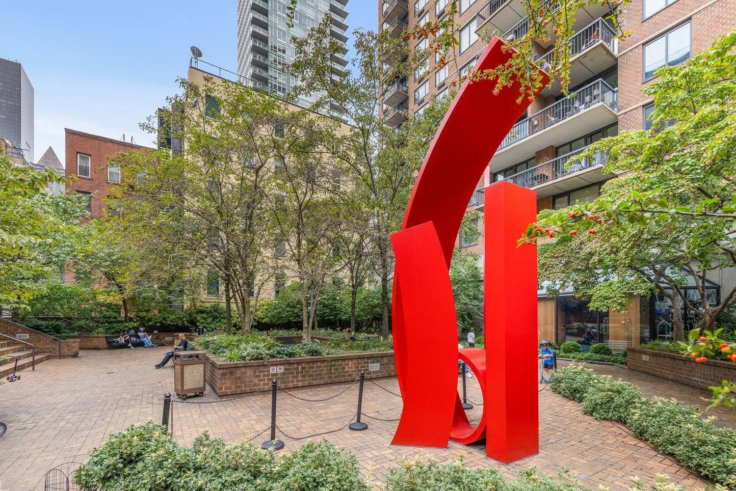 a bench and bench sitting in the middle of a park