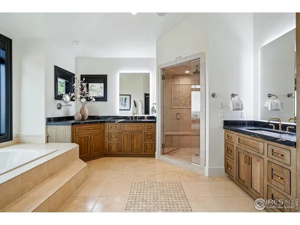 a kitchen with stainless steel appliances kitchen island granite countertop a sink and cabinets
