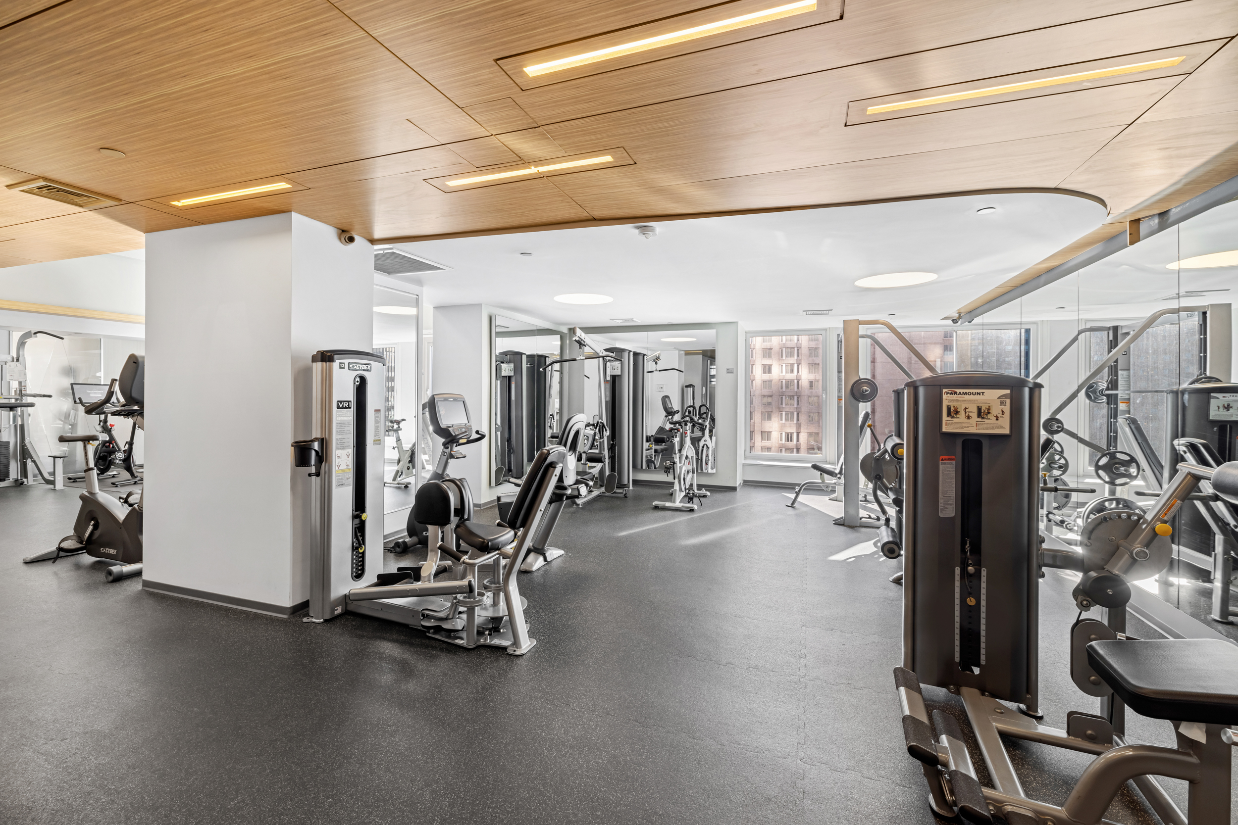 150 West 56th Street, Unit 3812 Manhattan, NY 10019 - Photo 12 of 14 a view of a room with gym equipment