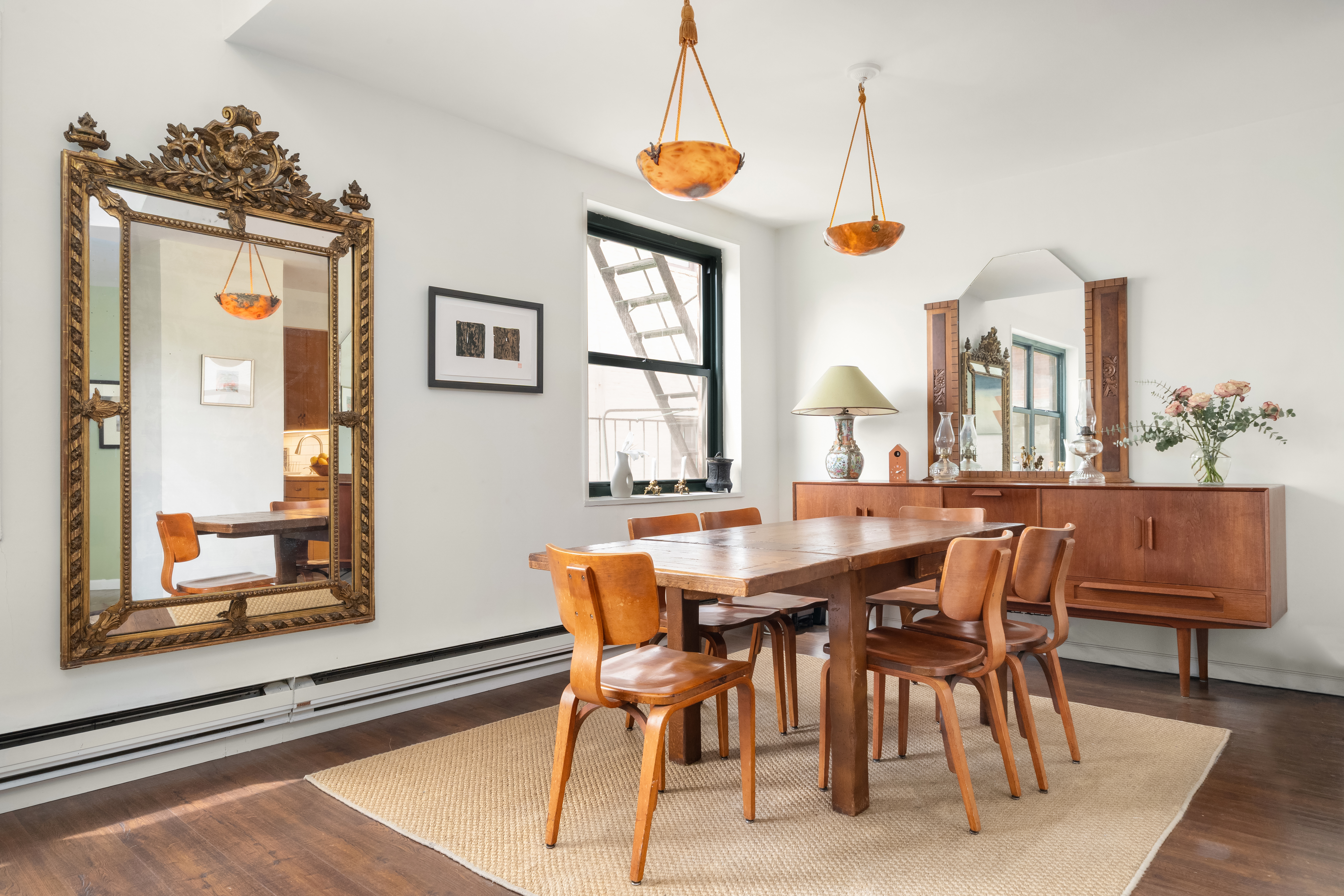 634 Washington Street, Unit 4B Manhattan, NY 10014 - Photo 4 of 12 a dining room with furniture and window