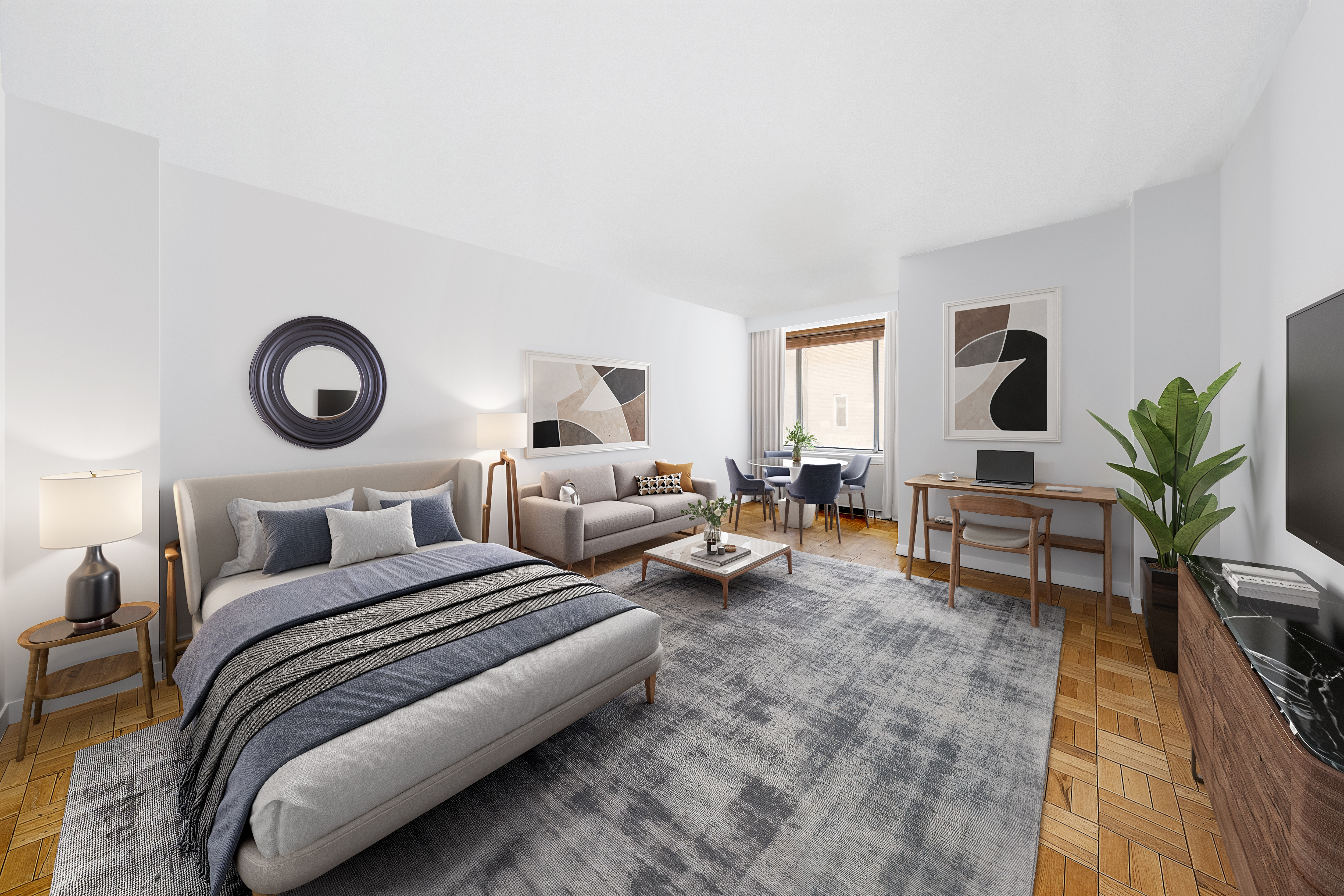 a living room with couches and a potted plant on table