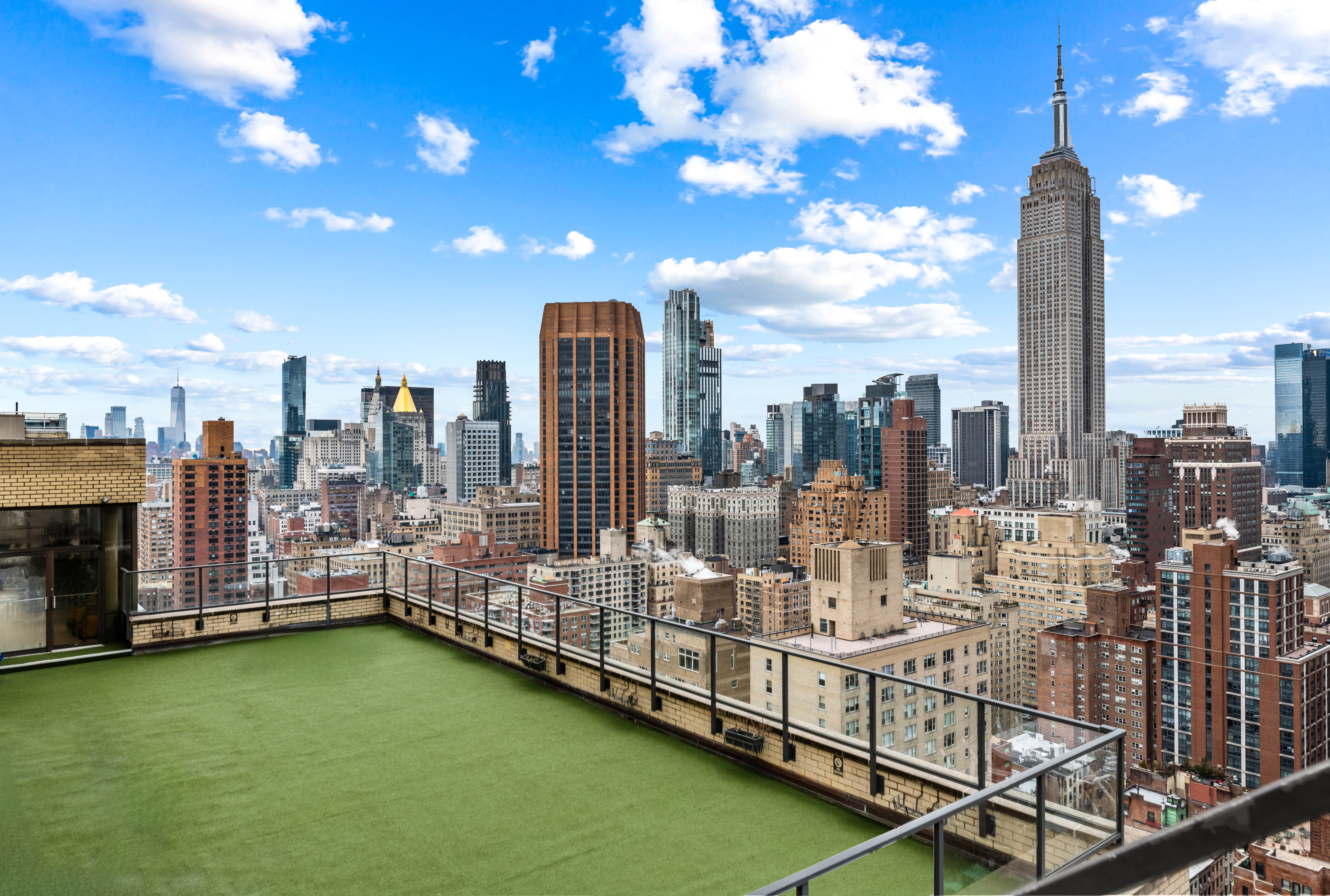 160 East 38th Street, Unit 26FG Manhattan, NY 10016 - Photo 18 of 23 a view of a balcony with city