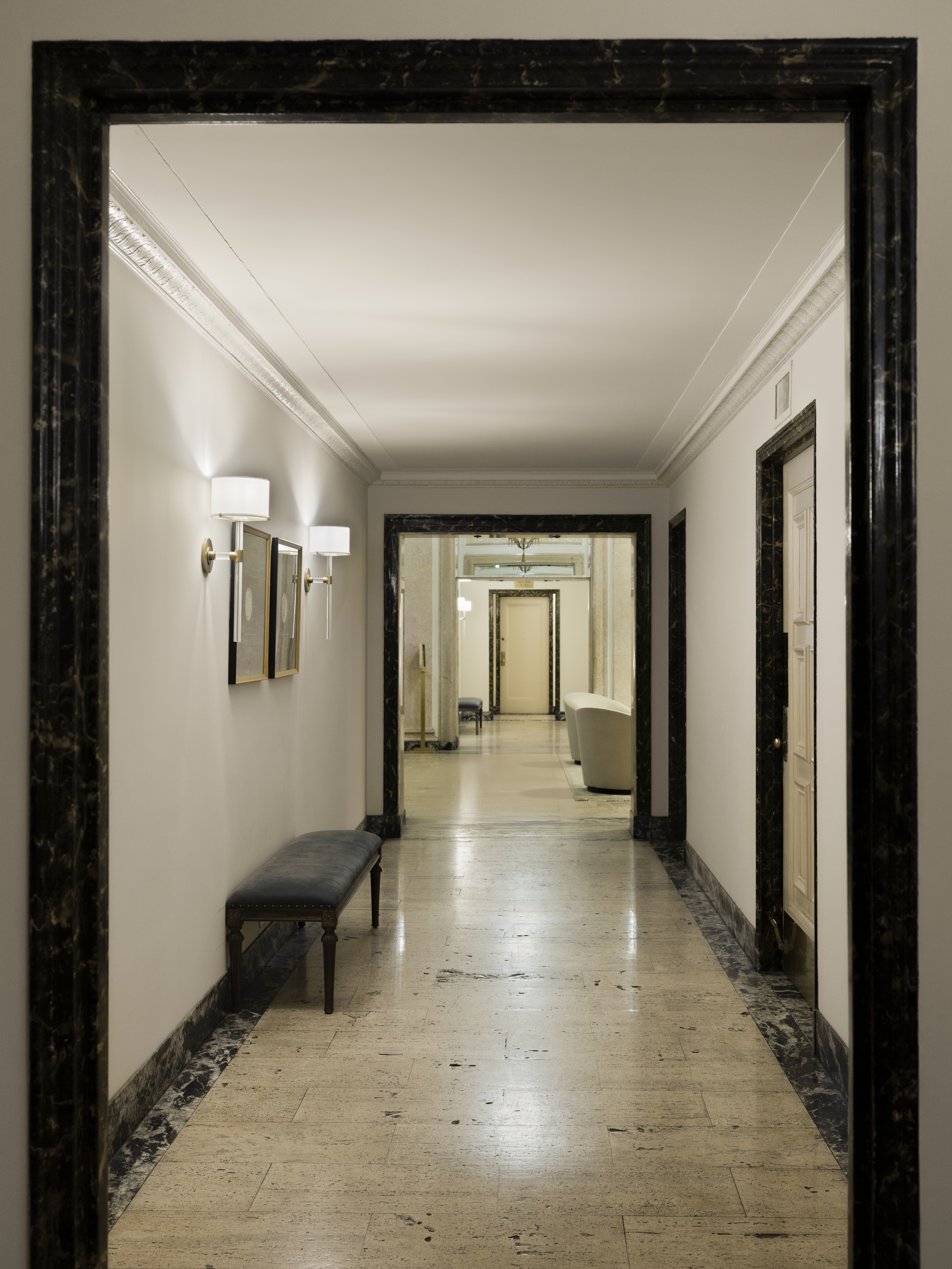 1158 5th Avenue, Unit 4A Manhattan, NY 10128 - Photo 18 of 23 a view of a hallway with wooden floor and a living room
