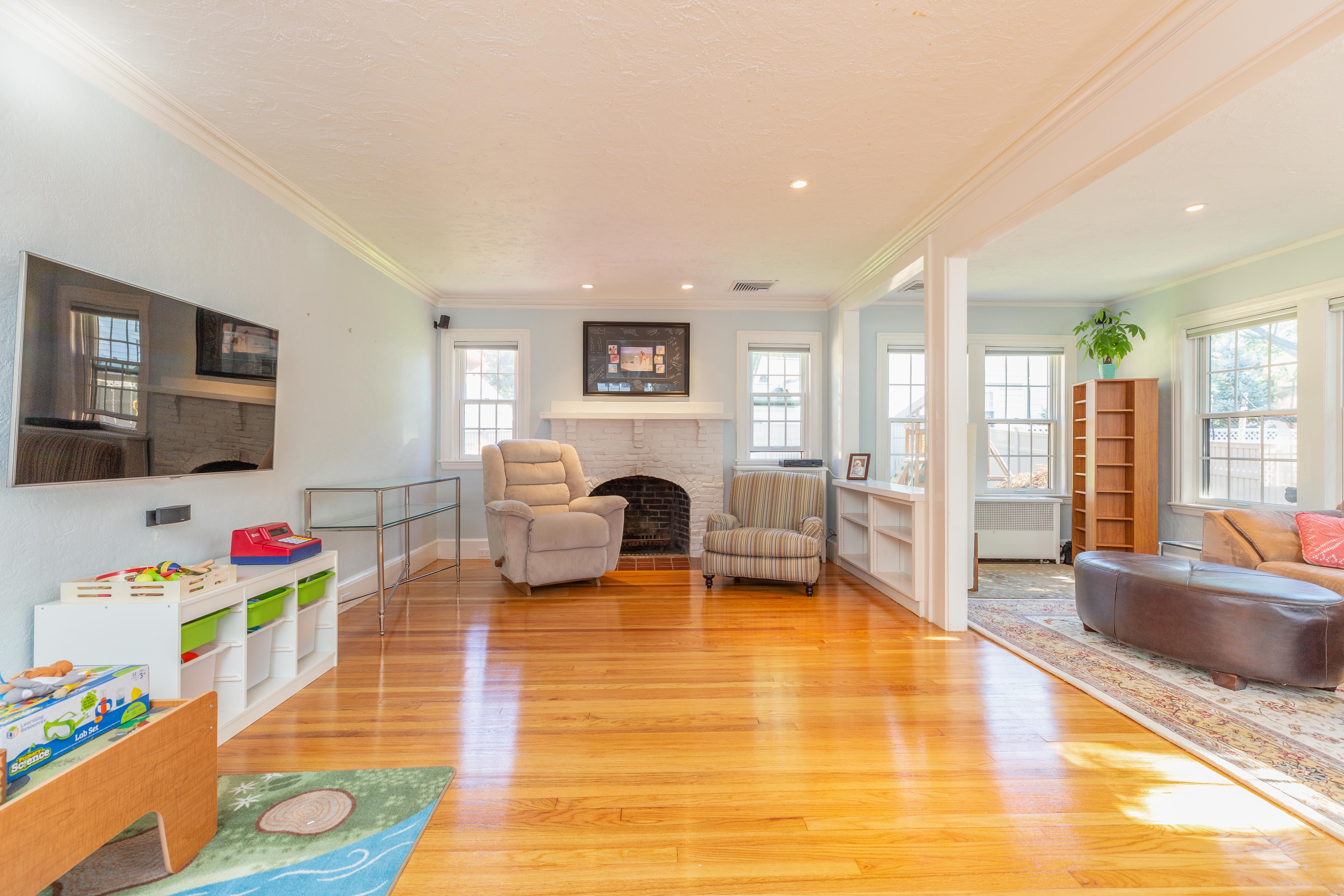 290 Dorset Road Waban, MA 02468 - Photo 2 of 23 a living room with furniture and a flat screen tv