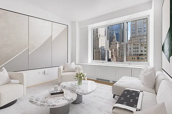 1 Wall Street, Unit 2512 Manhattan, NY 10005 - Photo 5 of 31 a living room with furniture and a window