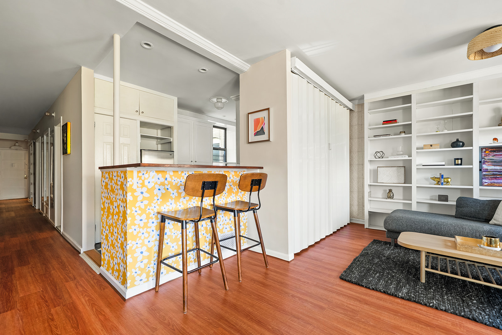 364 West 121st Street, Unit 4A Manhattan, NY 10027 - Photo 4 of 12 a living room with furniture and wooden floor