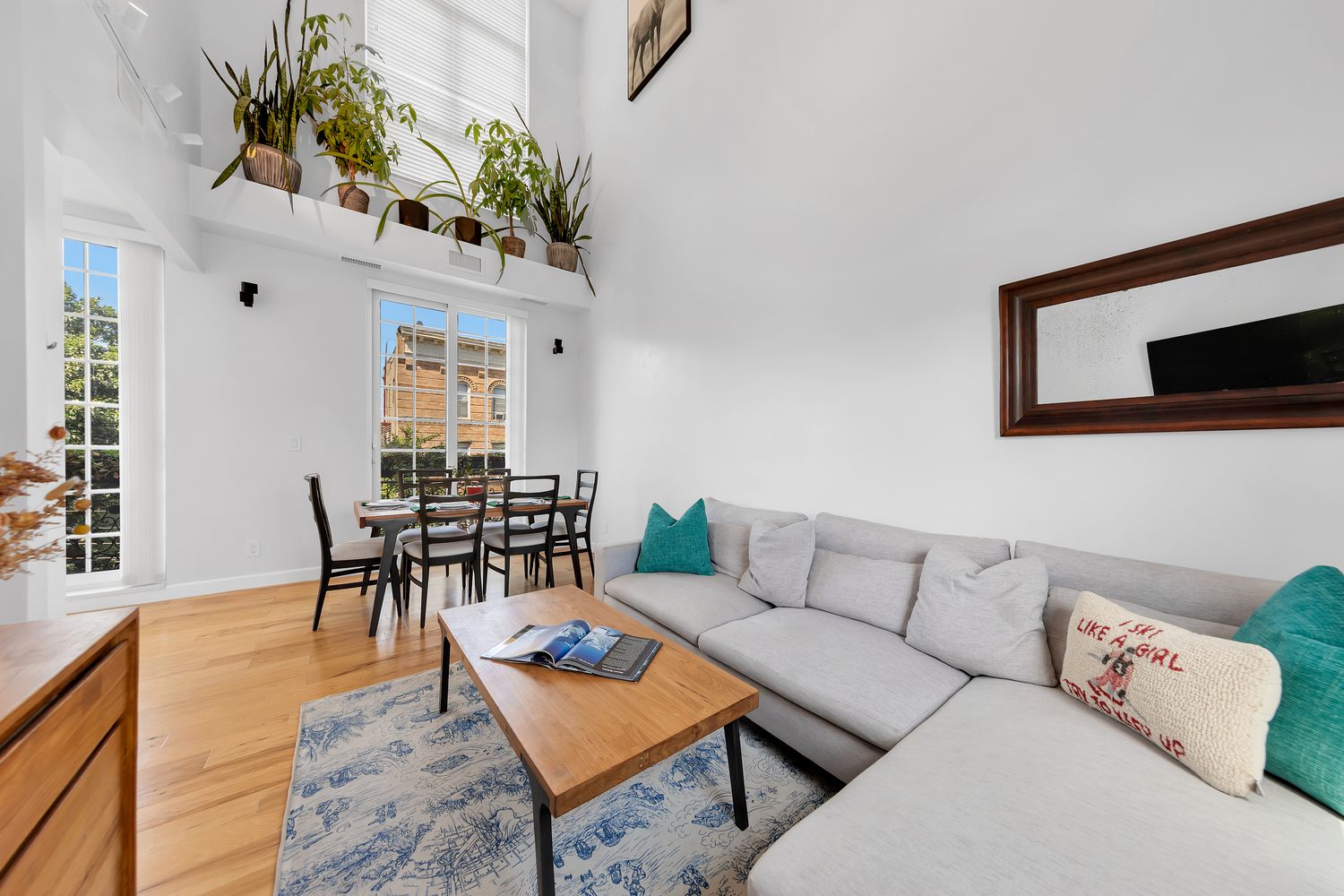 278 Nassau Avenue, Unit 4 Brooklyn, NY 11222 - Photo 4 of 17 a living room with furniture and a potted plant