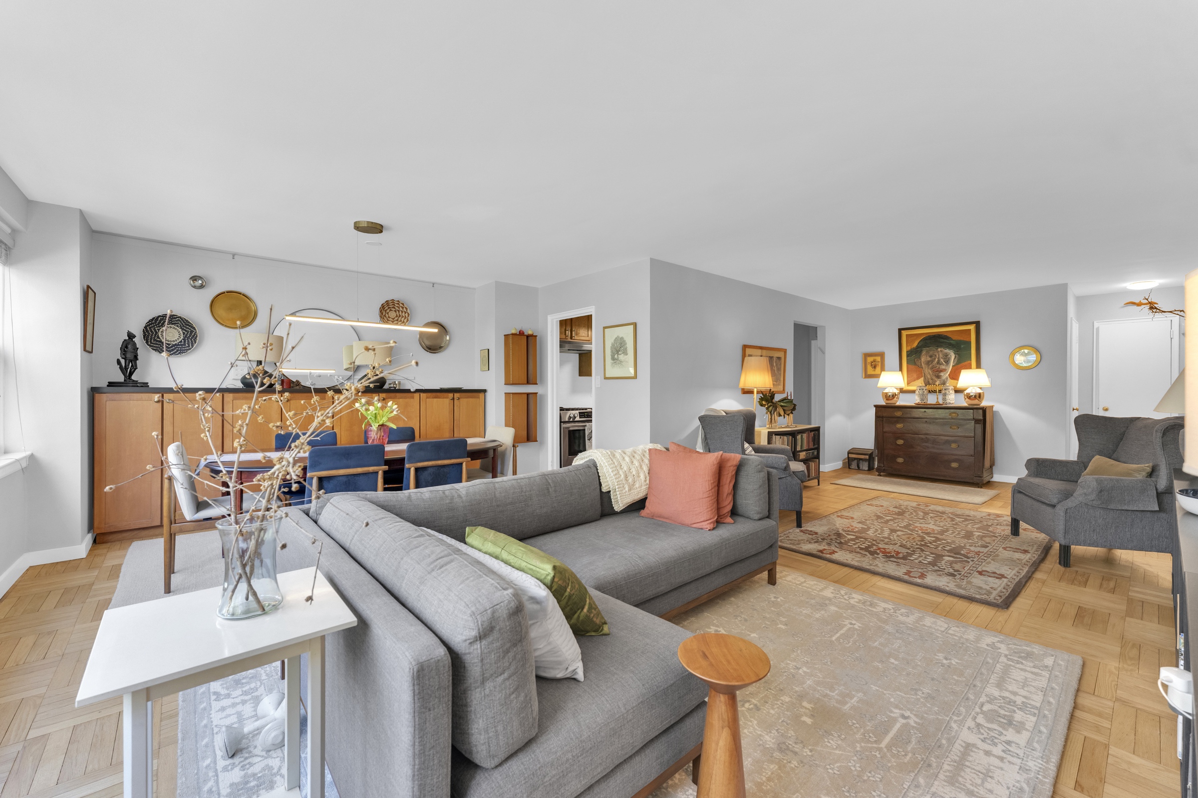 4555 Henry Hudson Parkway West, Unit A310 Bronx, NY 10471 - Photo 6 of 16 a living room with furniture and wooden floor