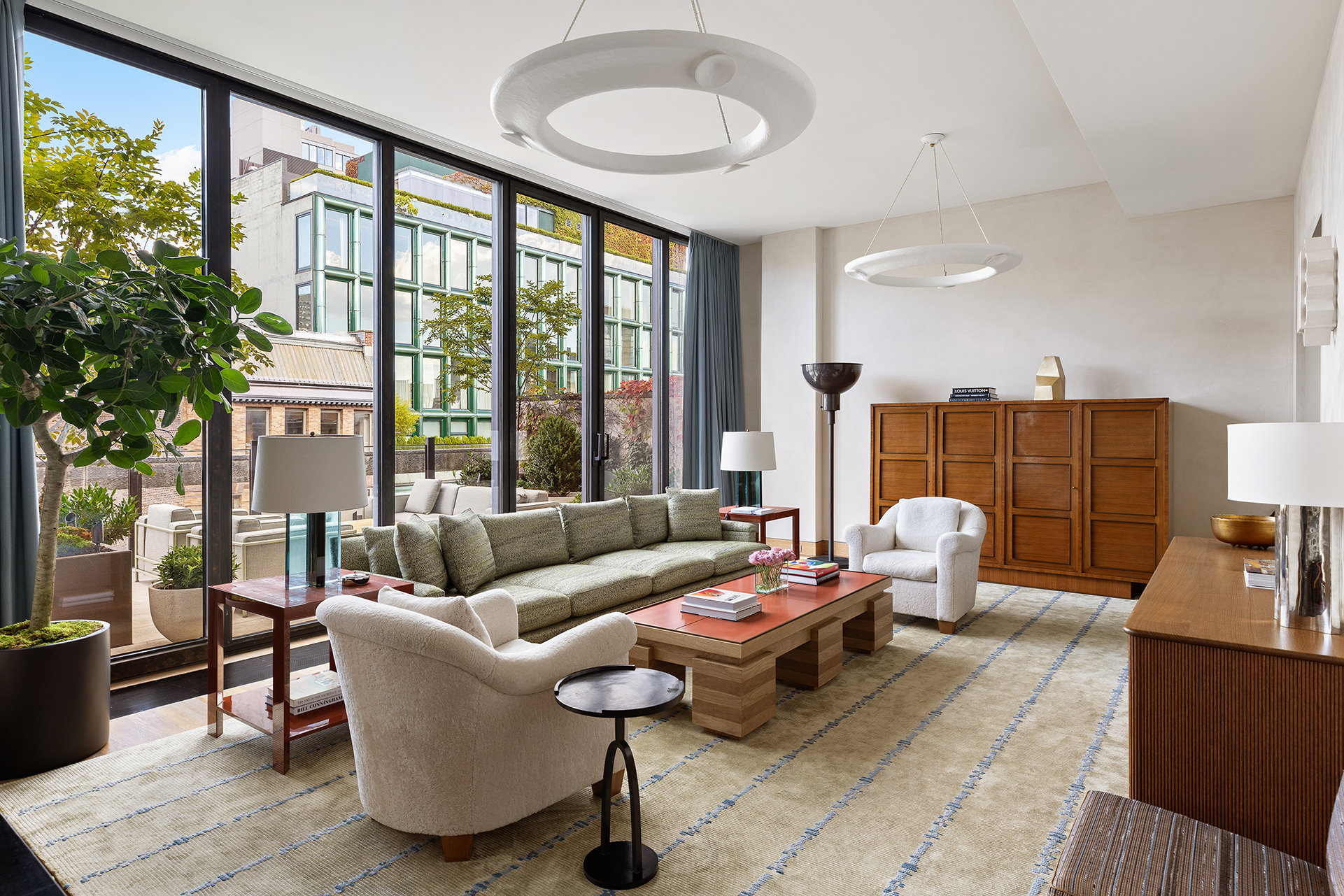 25 Bond Street, Unit PHW Manhattan, NY 10012 - Photo 5 of 34 a living room with furniture and a large window