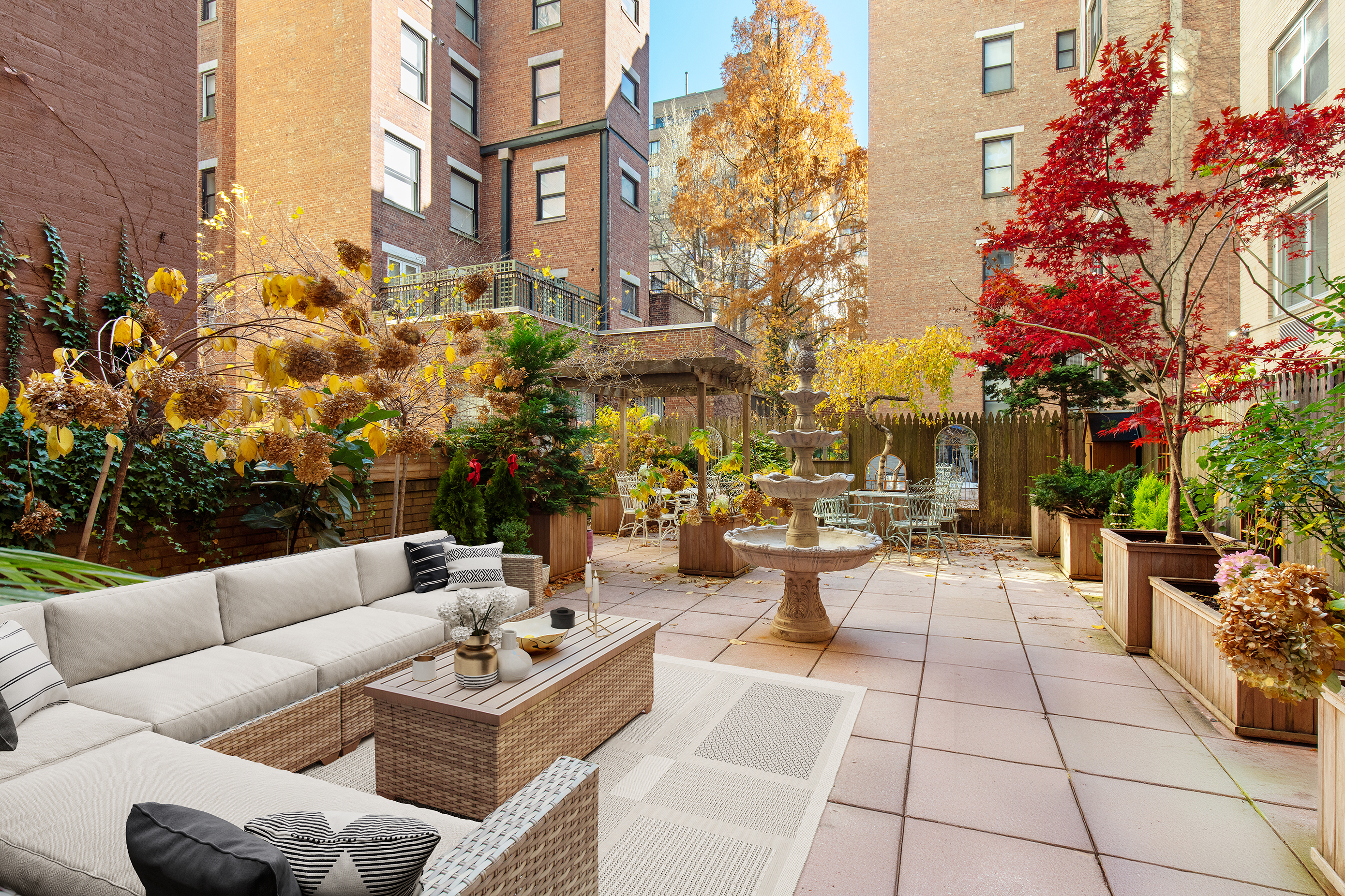 923 5th Avenue, Unit 2A Manhattan, NY 10021 - Photo 12 of 14 a view of a patio with couches and potted plants