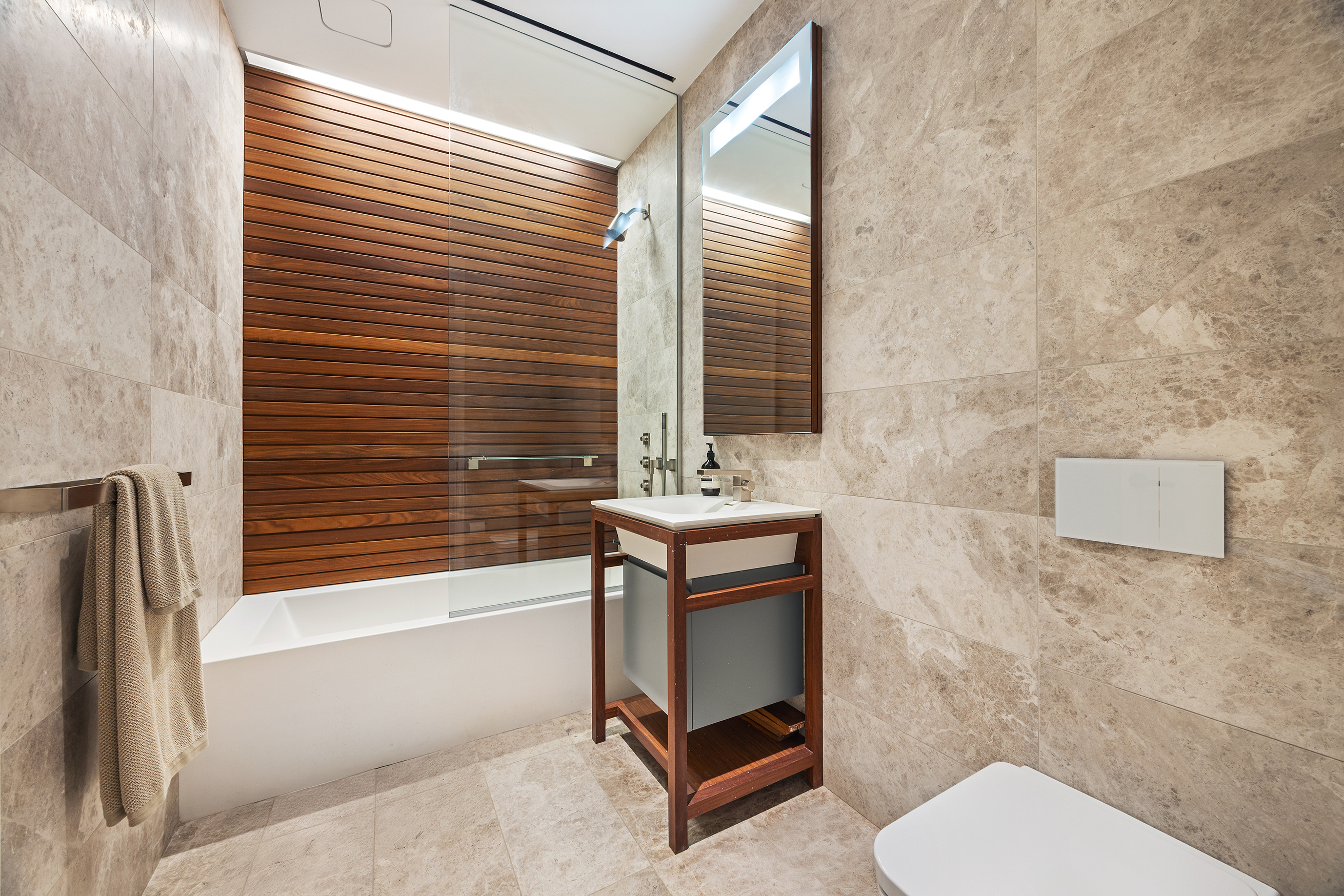 1 Great Jones Alley, Unit 10 Manhattan, NY 10012 - Photo 25 of 41 a bathroom with a sink toilet and shower