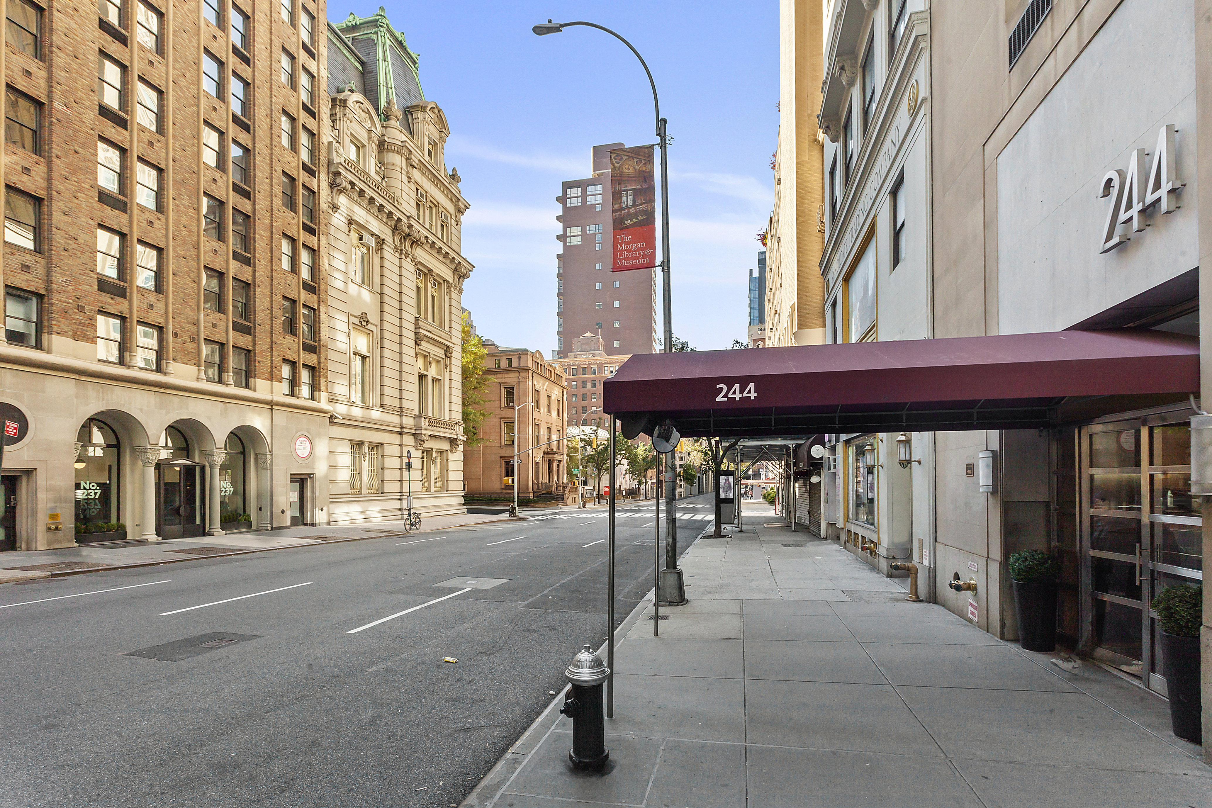 244 Madison Avenue, Unit PHE Manhattan, NY 10016 - Photo 14 of 20 a view of a building with a street