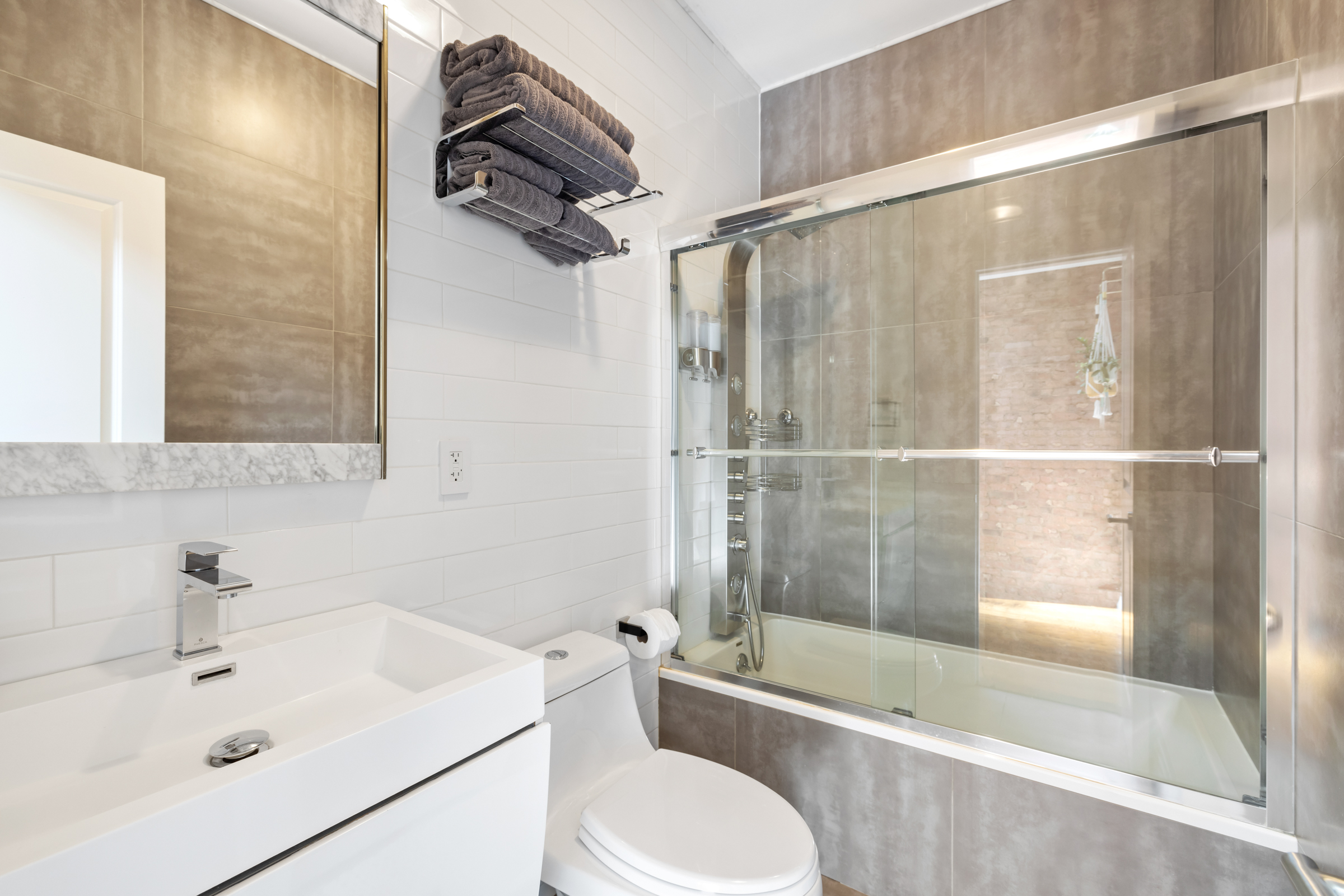 439 A Monroe Street Brooklyn, NY 11221 - Photo 16 of 29 a bathroom with a sink toilet and shower