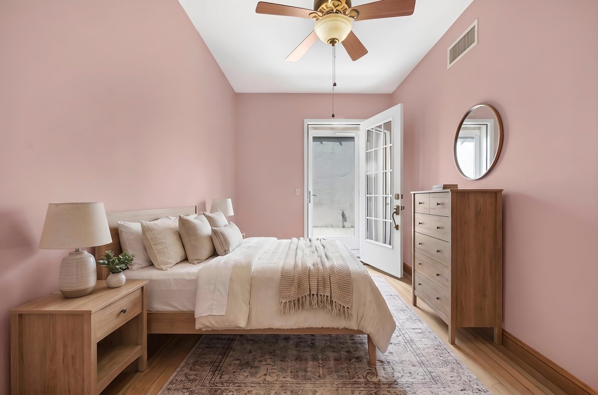 1702 11th Avenue Brooklyn, NY 11218 - Photo 9 of 25 a bed room with a bed and a chandelier