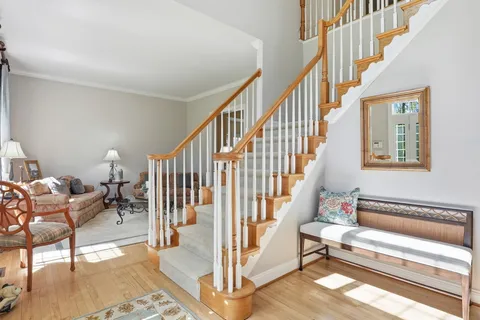 a kitchen with stainless steel appliances granite countertop a sink and cabinets