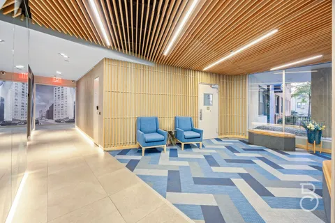 a lobby with furniture