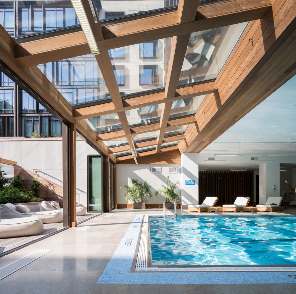 429 Kent Avenue, Unit 912 Brooklyn, NY 11249 - Photo 4 of 11 a view of swimming pool with a outdoor seating