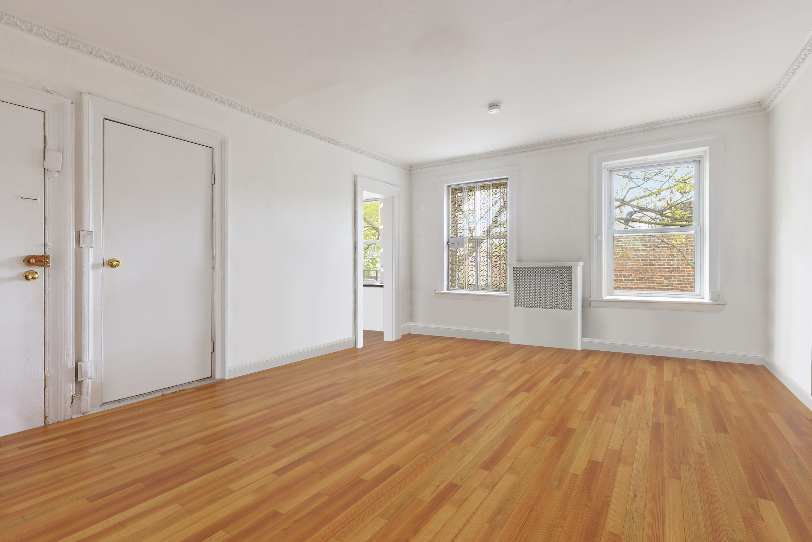 56 Joralemon Street Brooklyn, NY 11201 - Photo 8 of 18 a view of empty room with wooden floor and fan