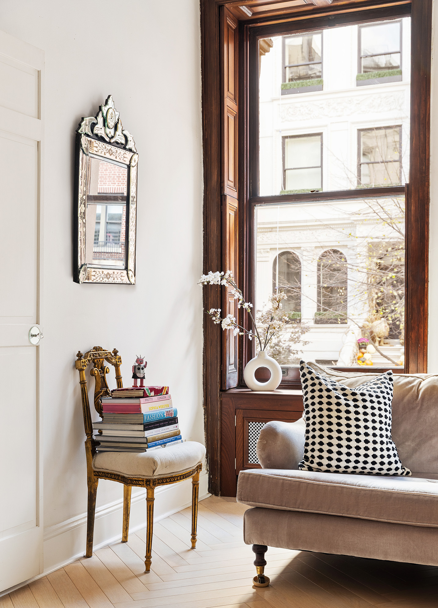 133 West 75th Street, Unit PARLOUR A Manhattan, NY 10023 - Photo 5 of 11 a living room with furniture and a window
