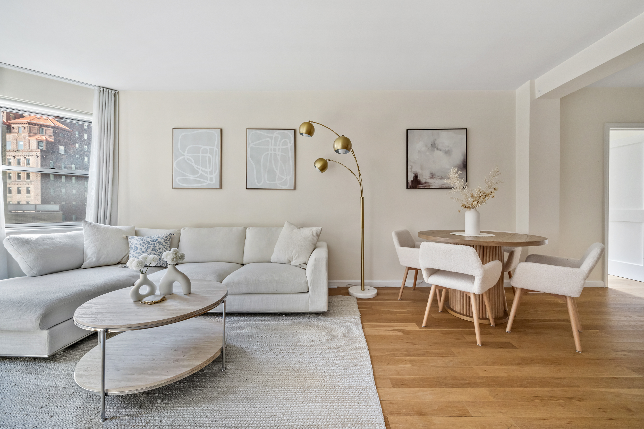 80 Park Avenue, Unit 11D Manhattan, NY 10016 - Photo 1 of 7 a living room with furniture wooden floor and a table
