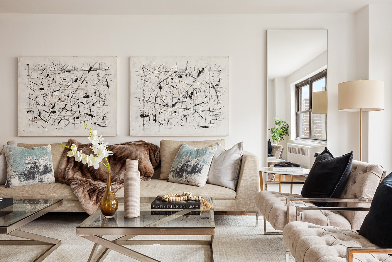 185 West End Avenue, Unit 16D Manhattan, NY 10023 - Photo 2 of 11 a living room with furniture and a couch