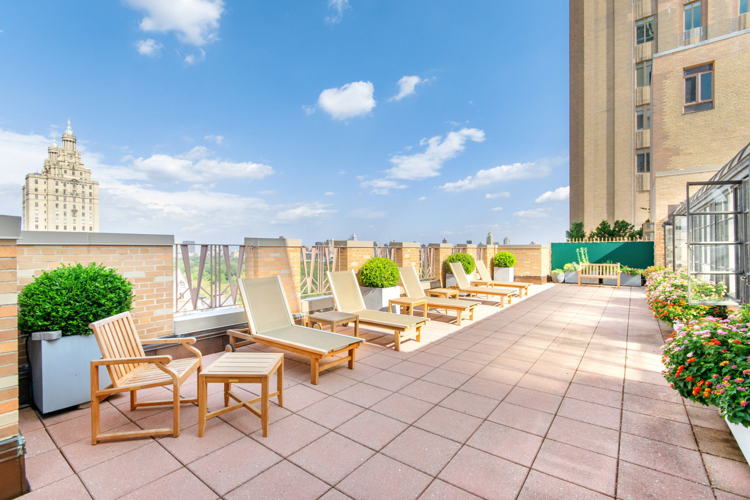 115 Central Park West, Unit 16H Manhattan, NY 10023 - Photo 27 of 30 a view of swimming pool with outdoor seating and plants